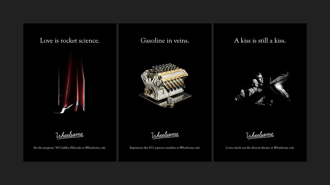 Three vertical black posters display different product categories: “Love is rocket science,” “Gasoline in veins,” and “A kiss is still a kiss.” The left poster shows a red rocket engine, the middle shows a vintage car engine, and the right shows a black and white photograph of two people kissing. Each poster includes the brand name “Wheelsome” and a tagline: “See the gorgeous ’59 Cadillac Eldorado at Wheelsome cafe.” and “Experience the V12 espresso machine at Wheelsome cafe.”