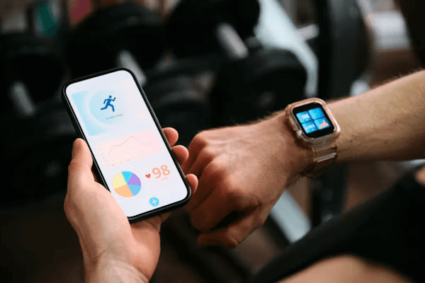 A person checking health metrics on a smartwatch