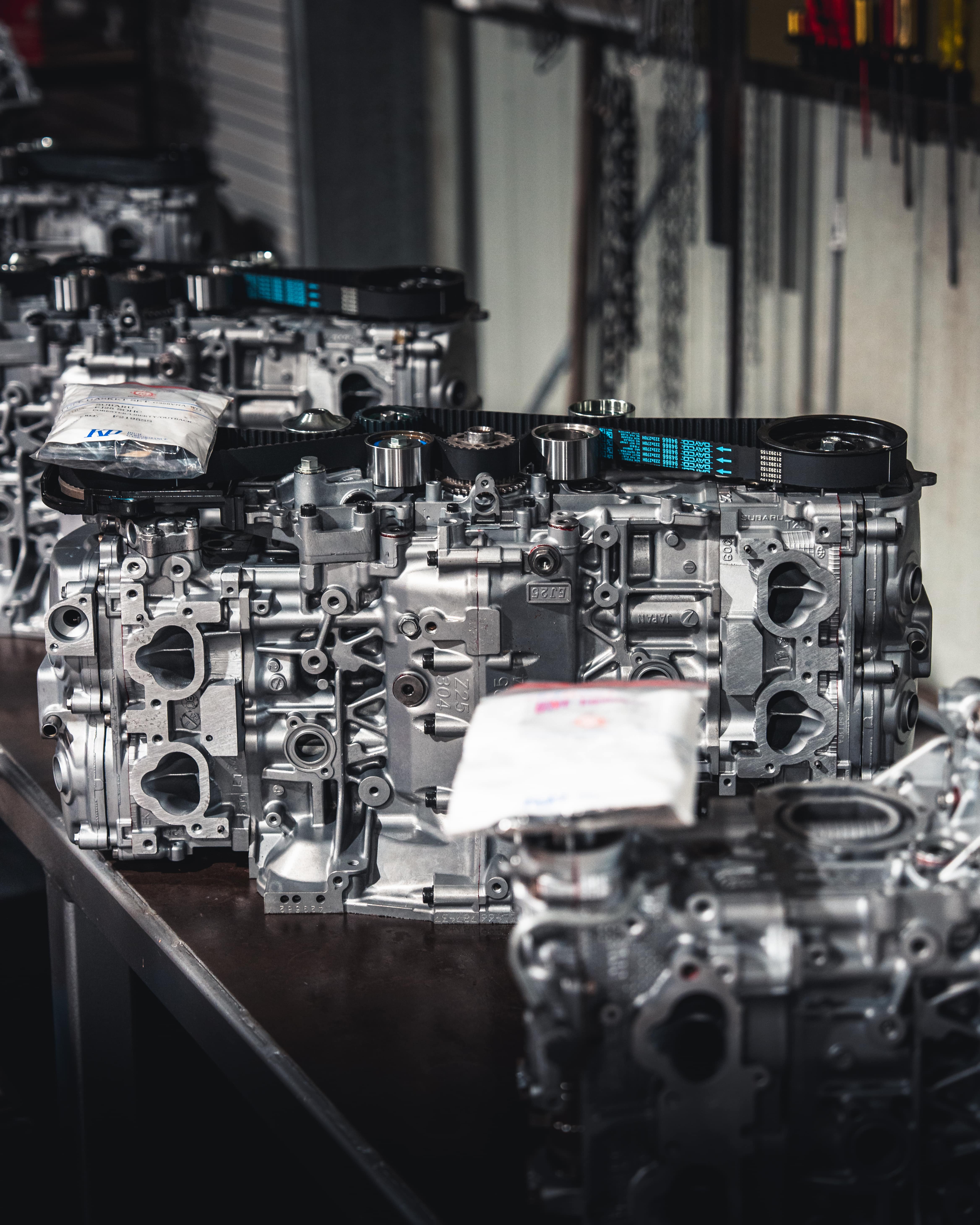 woman sitting around table holding tablet