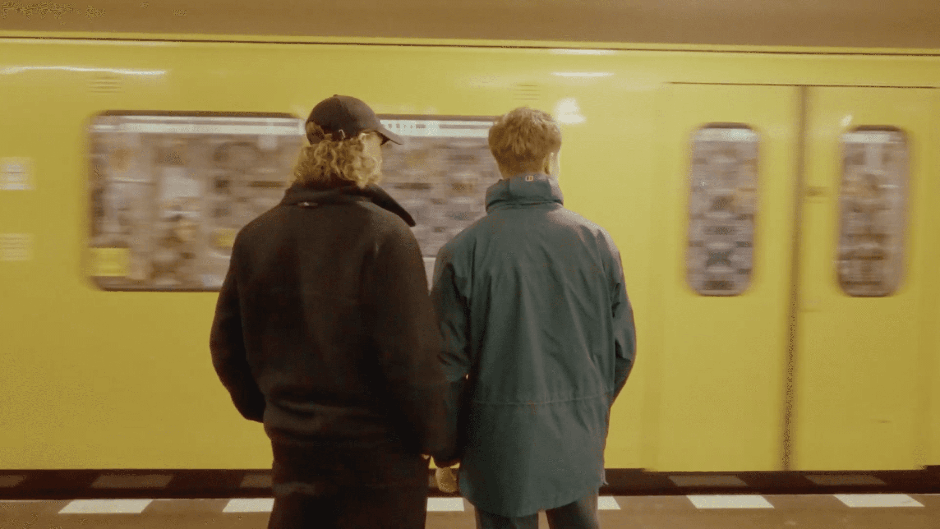 needle tower among small buildings