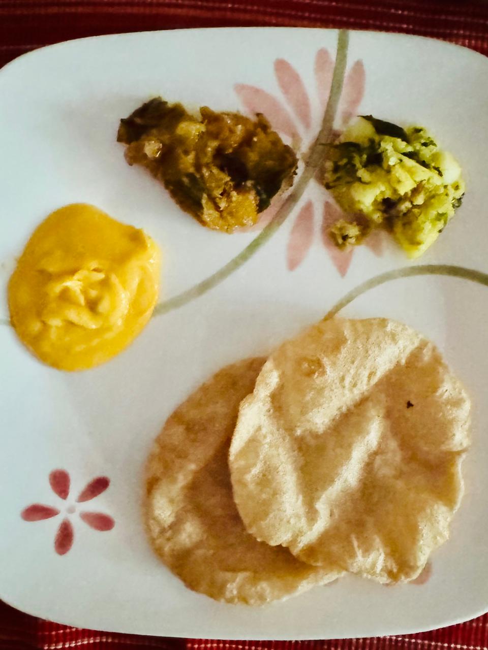 Our lunch with puri, kaddu, aloo and amrakhand