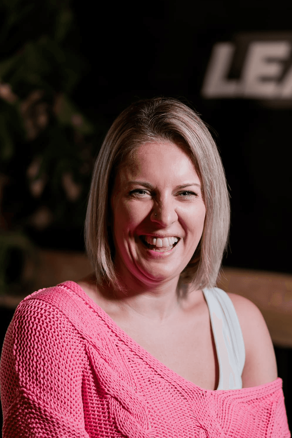 headshot of female in bright background