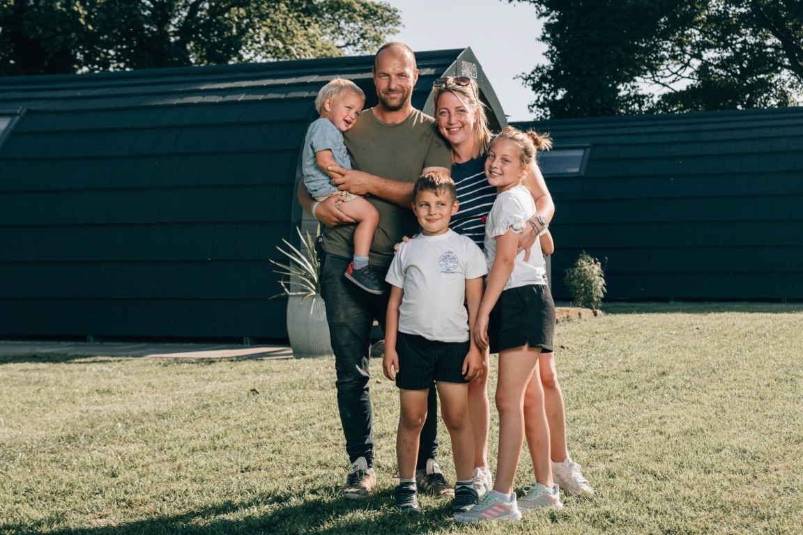 A photo of the Smith family at Eastfield Glamping Farm.