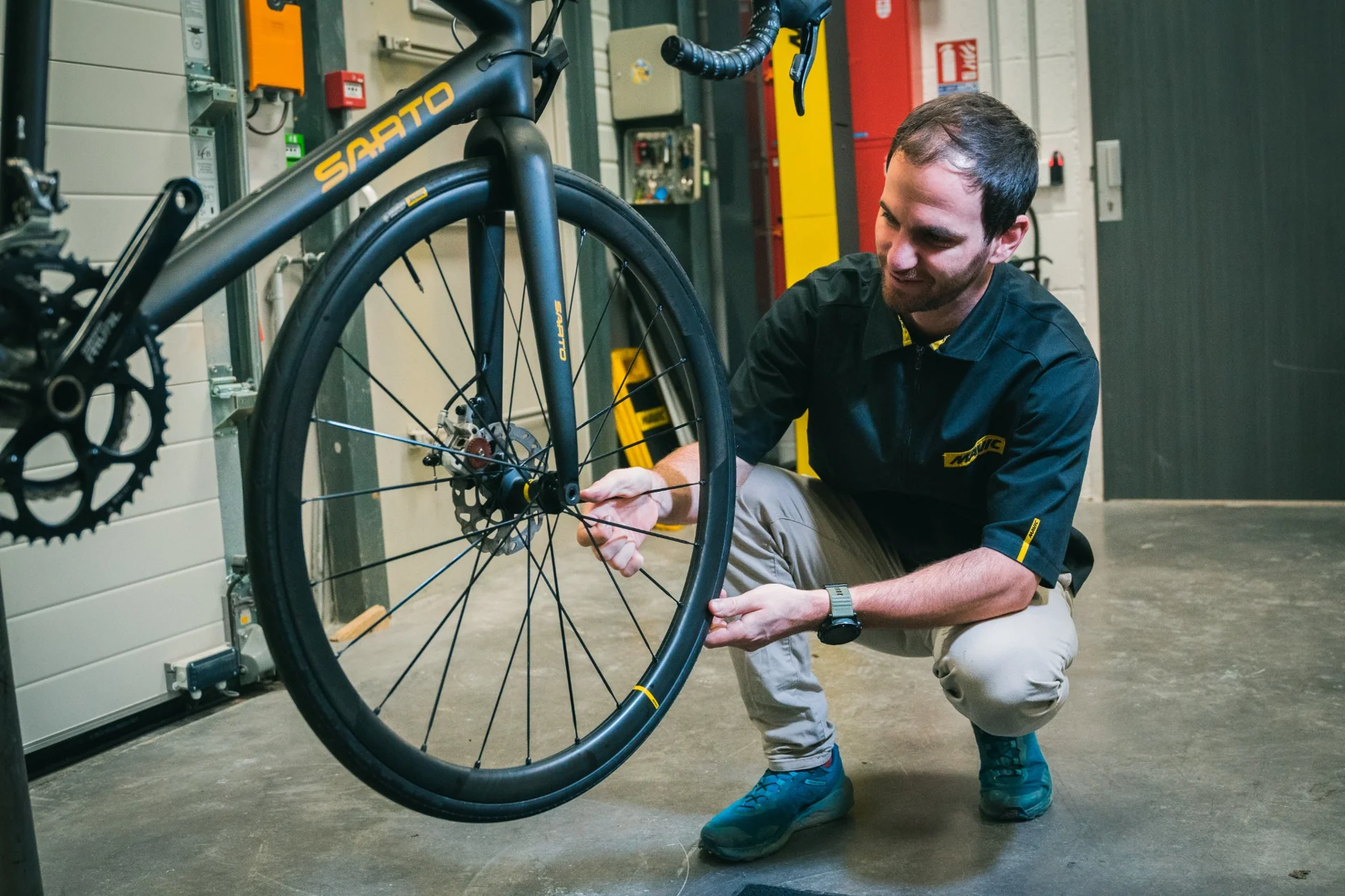 Technician analyzing a bike wheel