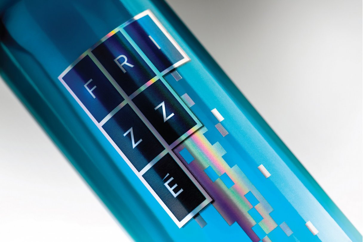 Rustic cabin in a golden field at sunset