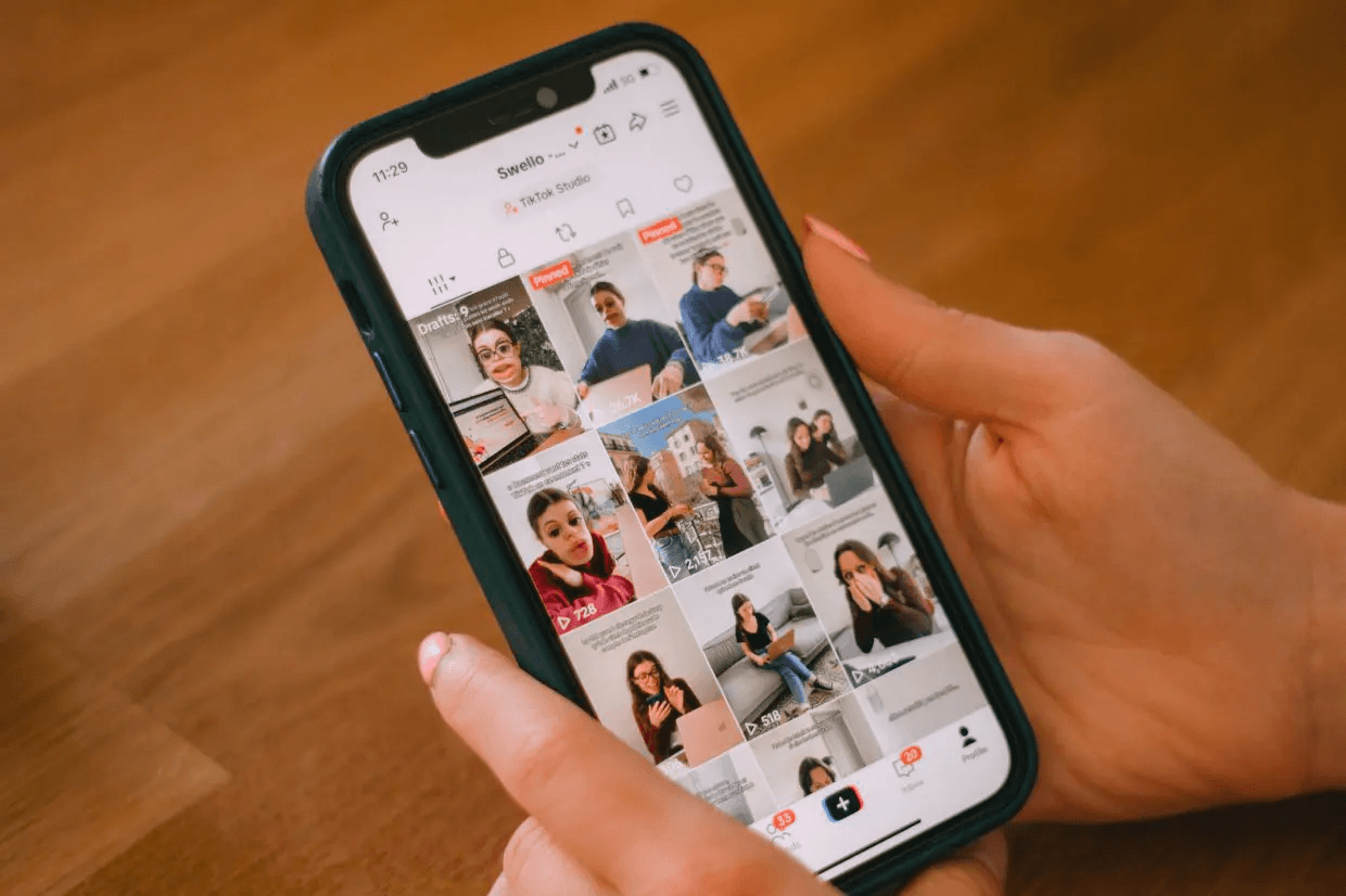 Person scrolling through a smartphone screen - Video Clipping for Social Media
