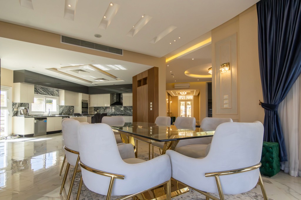 white and brown concrete building under blue sky during daytime