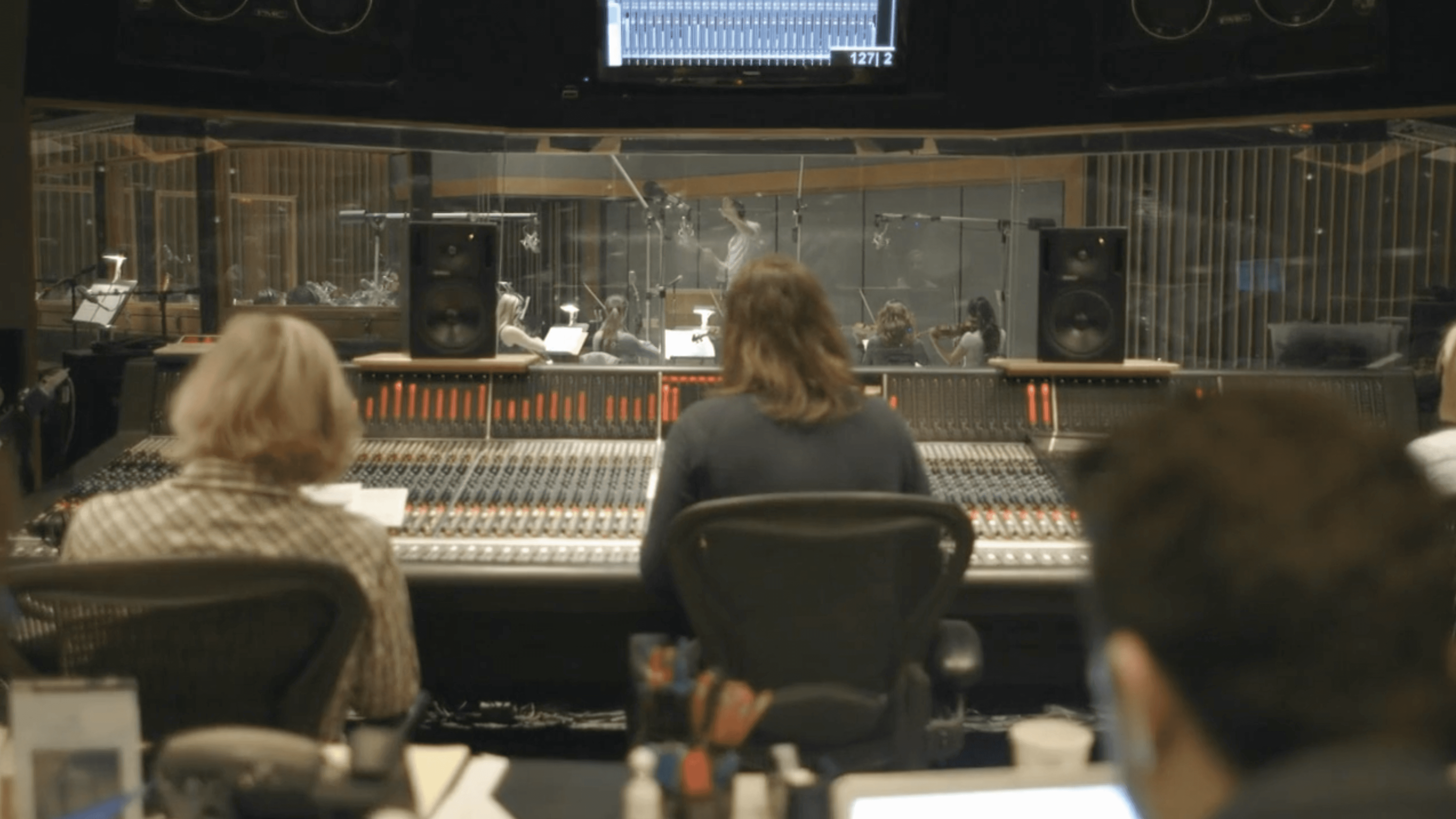 An orchestra recording in a