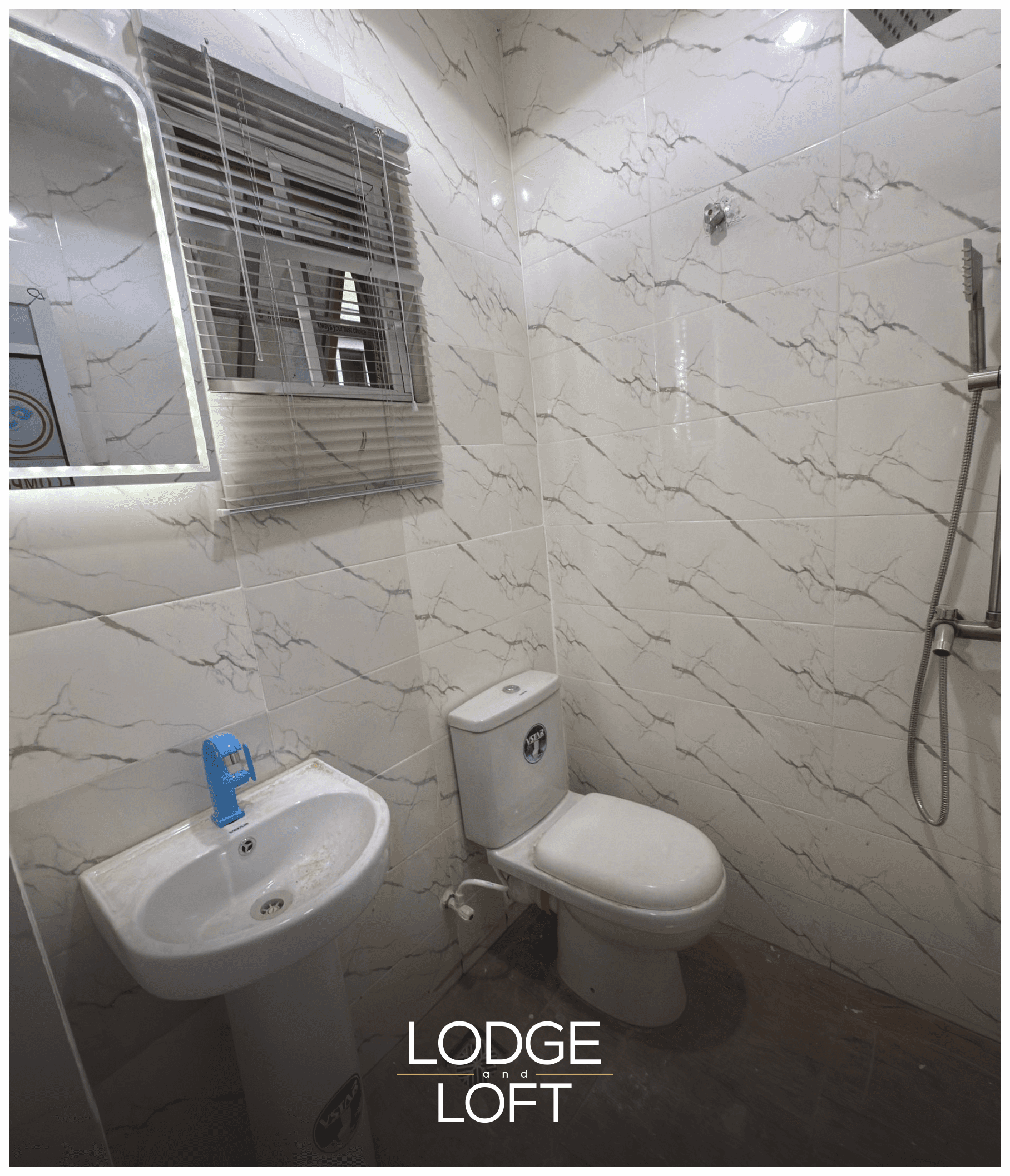 Clean modern bathroom at Luxeloft Isimi Apartment, shortlet apartment in Gbagada, Lagos