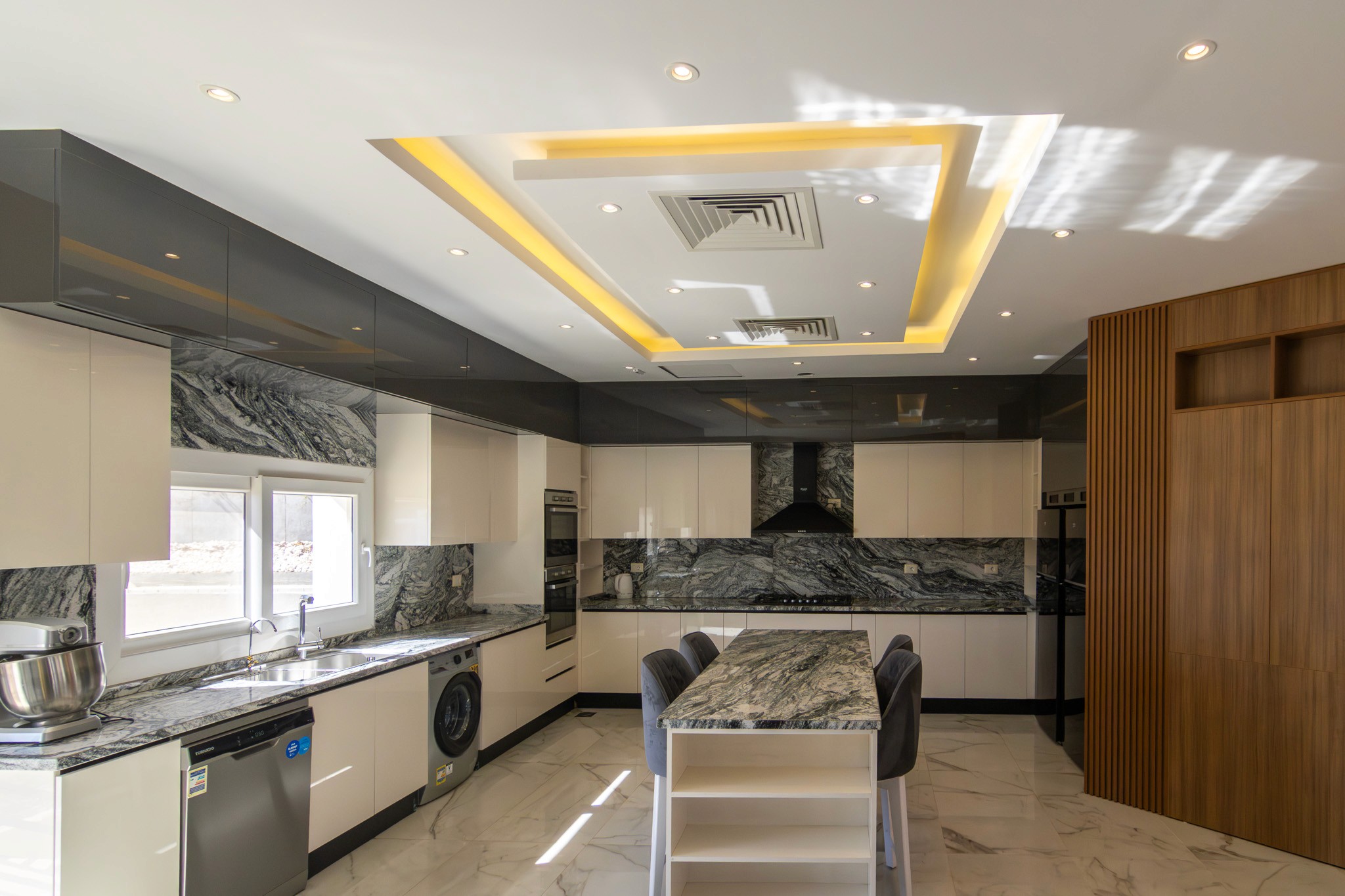 black and white wooden table and chairs