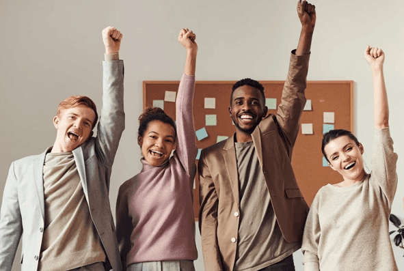 Diverse business team celebrating organisational performance results