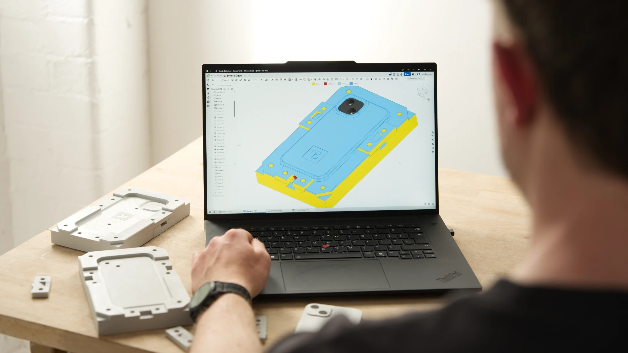 CAD engineering model of a phone case mould tool showing draft analysis and design for manufacture considerations.