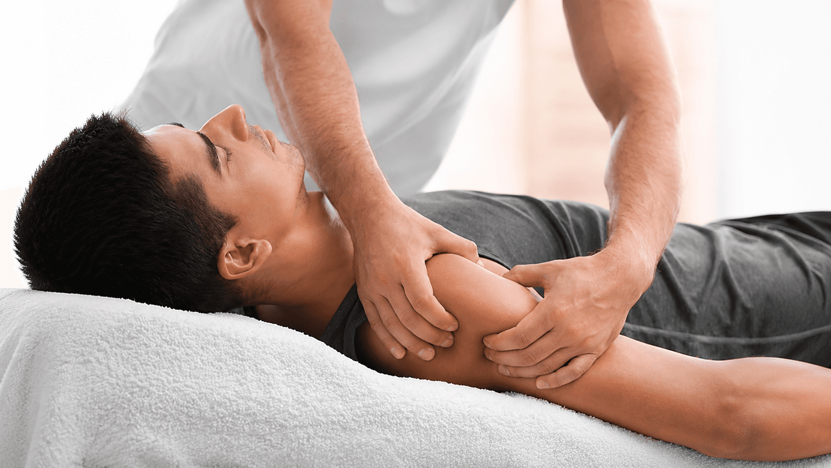 Physiotherapist treating a man during a musculoskeletal physiotherapy session at Ember & Ice Health rehabilitation center in Bangalore.