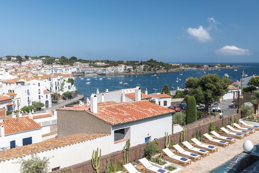 white bed with gray pillow