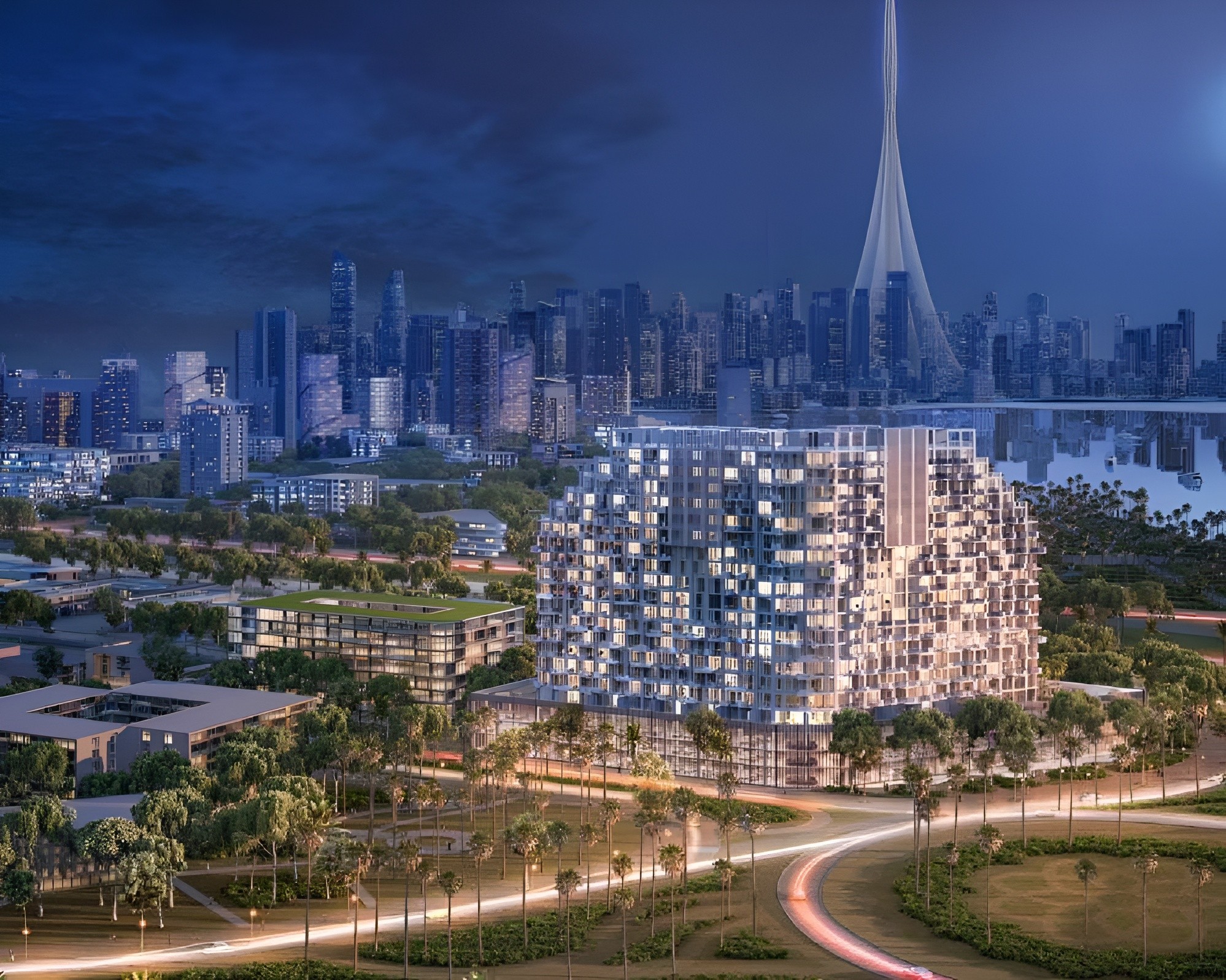 Evening aerial view of Farhad Azizi Residence located in a prime Dubai real estate hub.