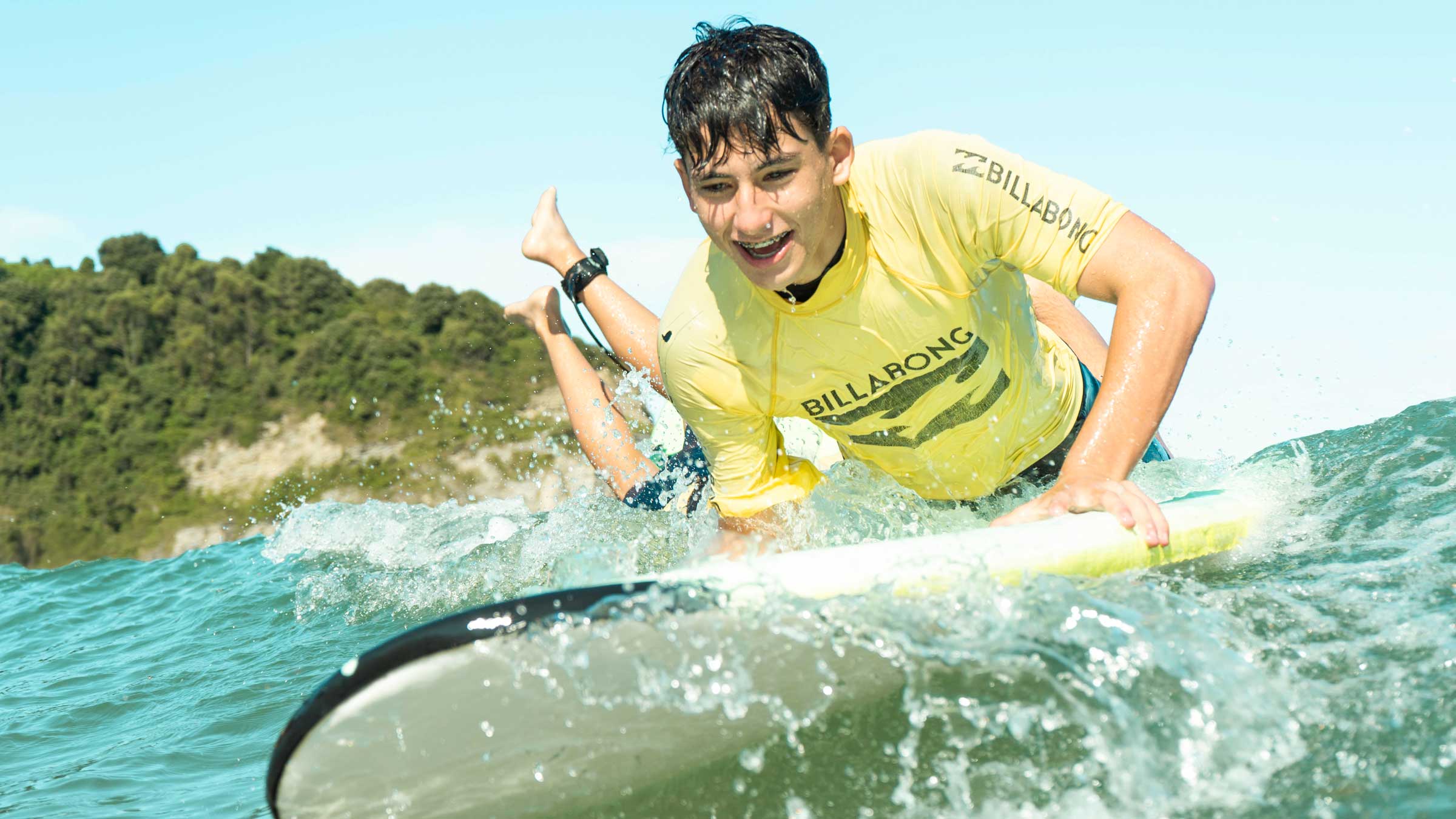 Man with surfing with paddle