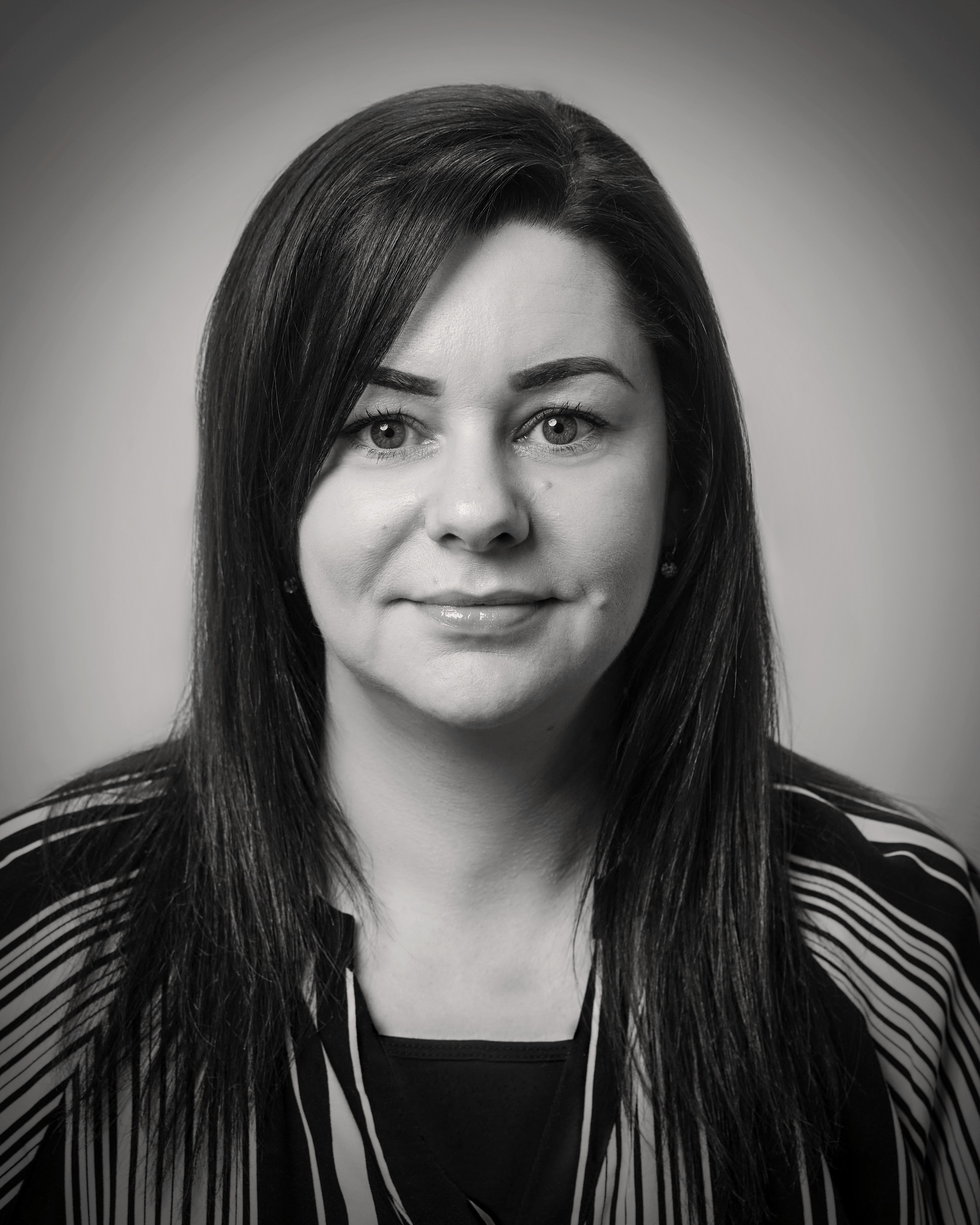 headshot of female in bright background