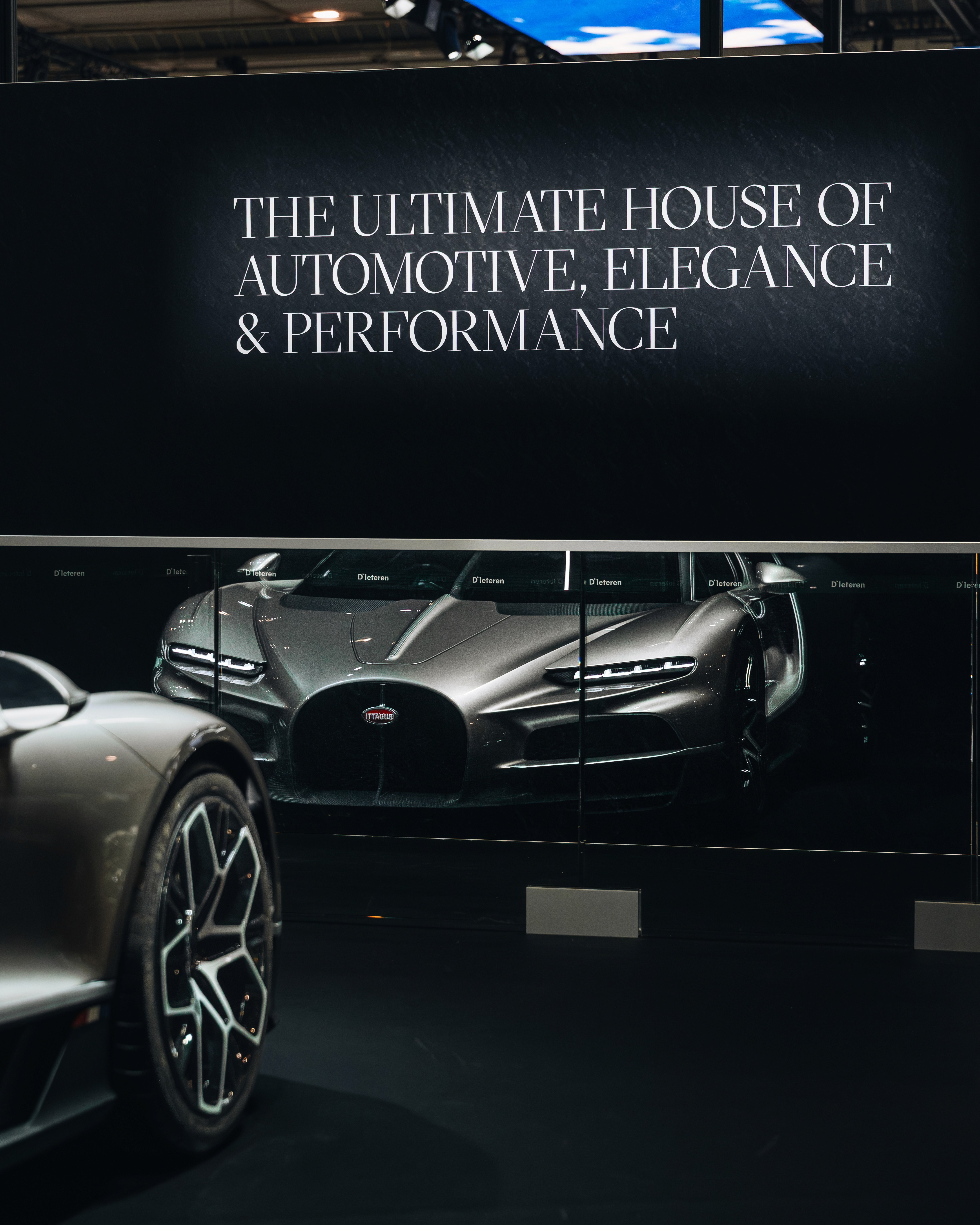 Profile portrait of a man in a white shirt against a light background