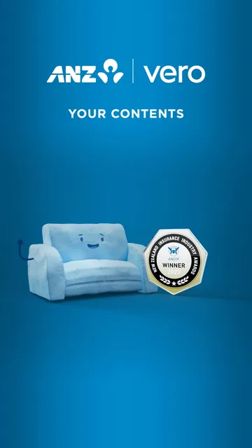 A soft blue sofa with a smiling face, under the ANZ logo