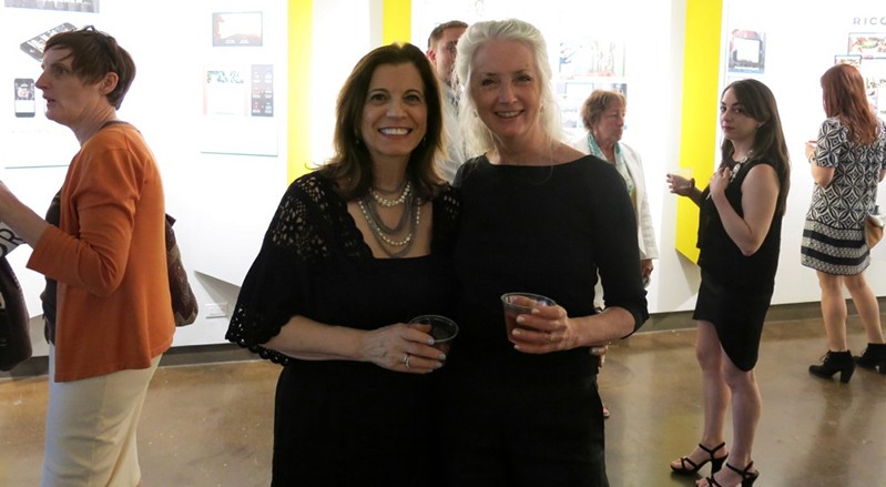 portrait of two women dressed in black