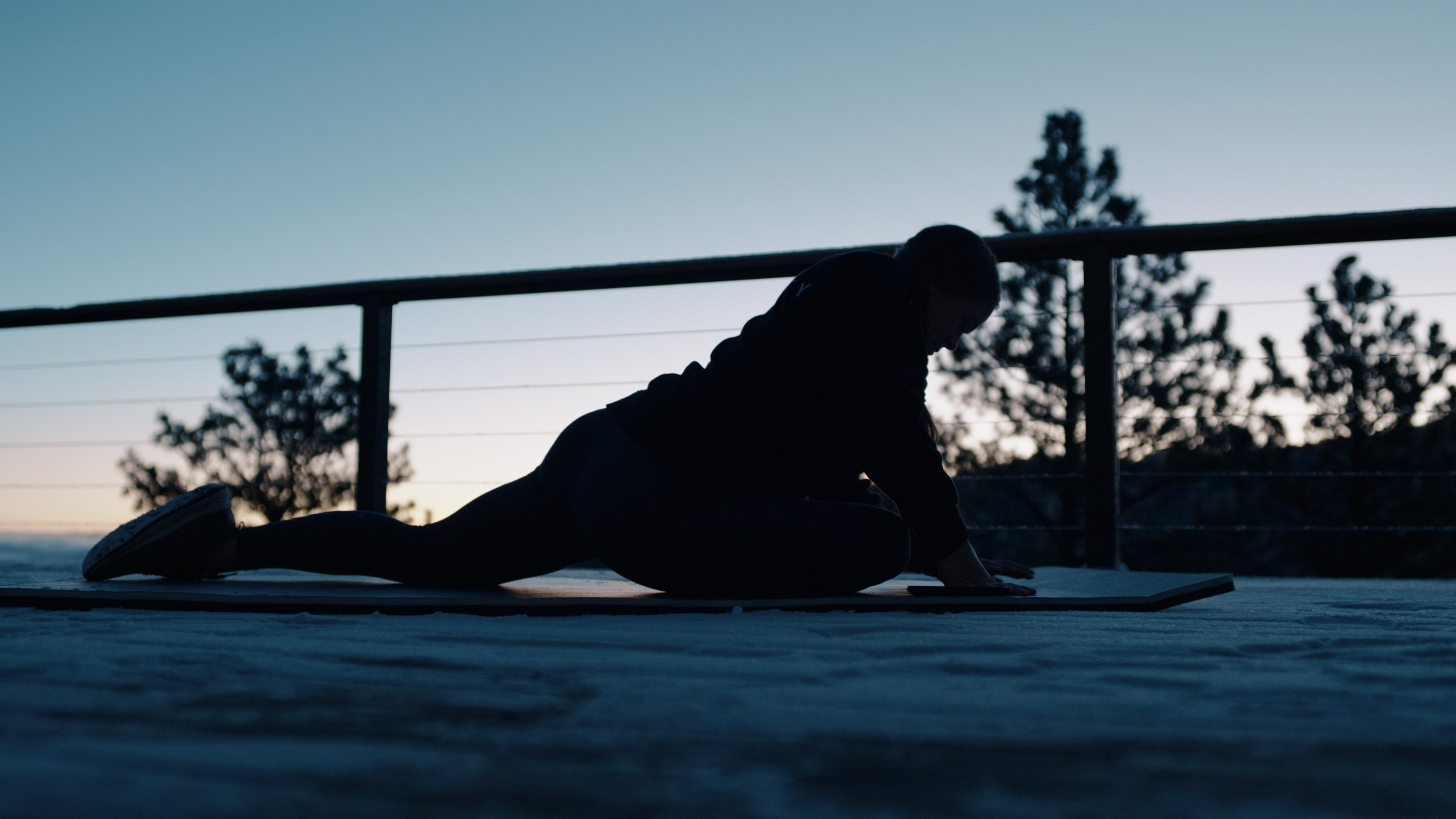 woman on a mat - Best Corporate Wellness Software