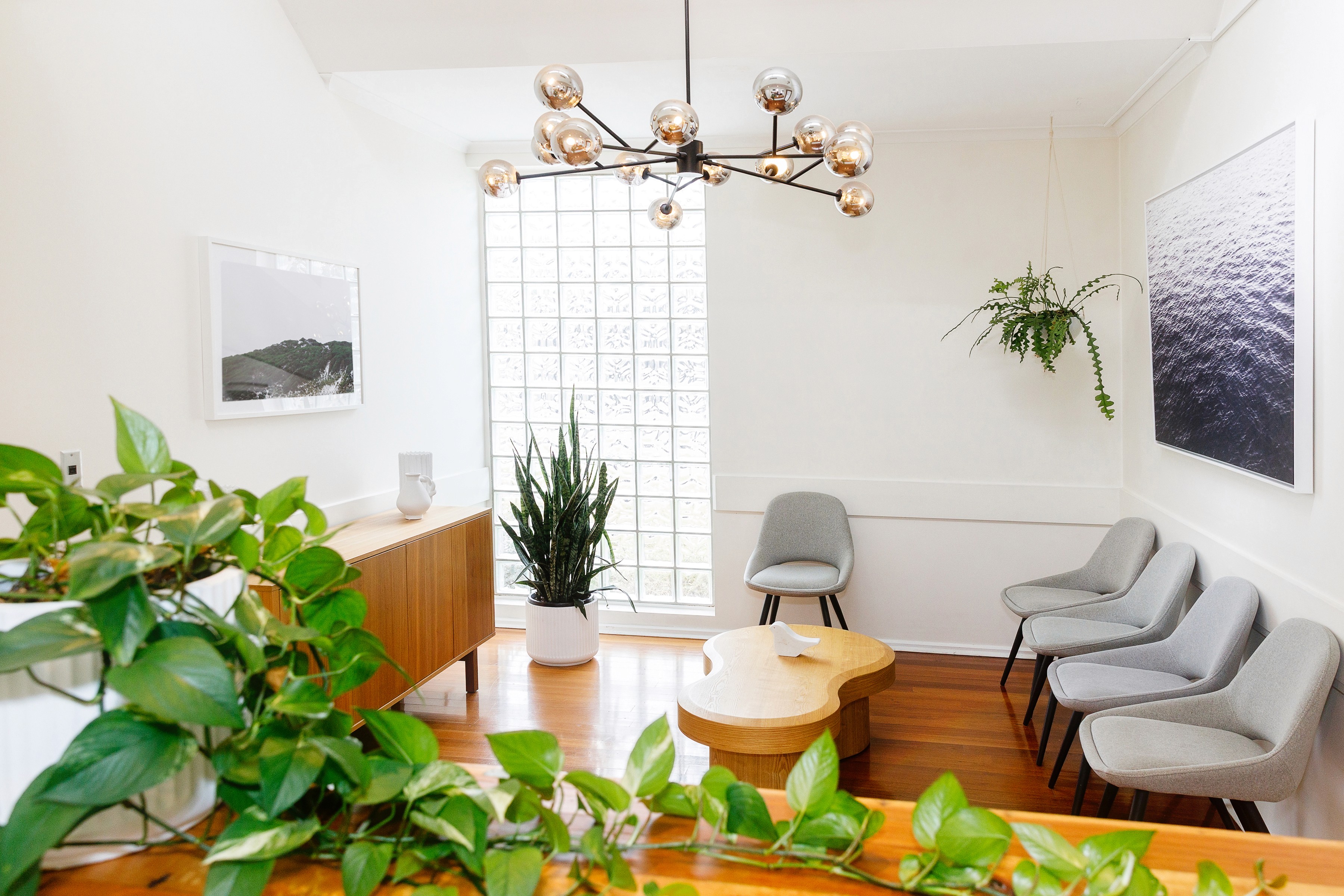 smiling happily caregiver hugging her old