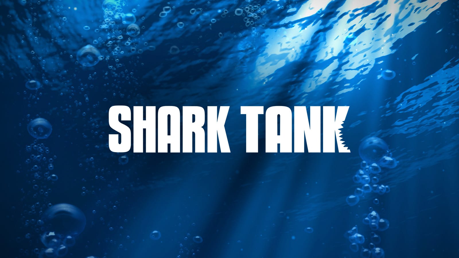 Shark Tank logo submerged underwater.