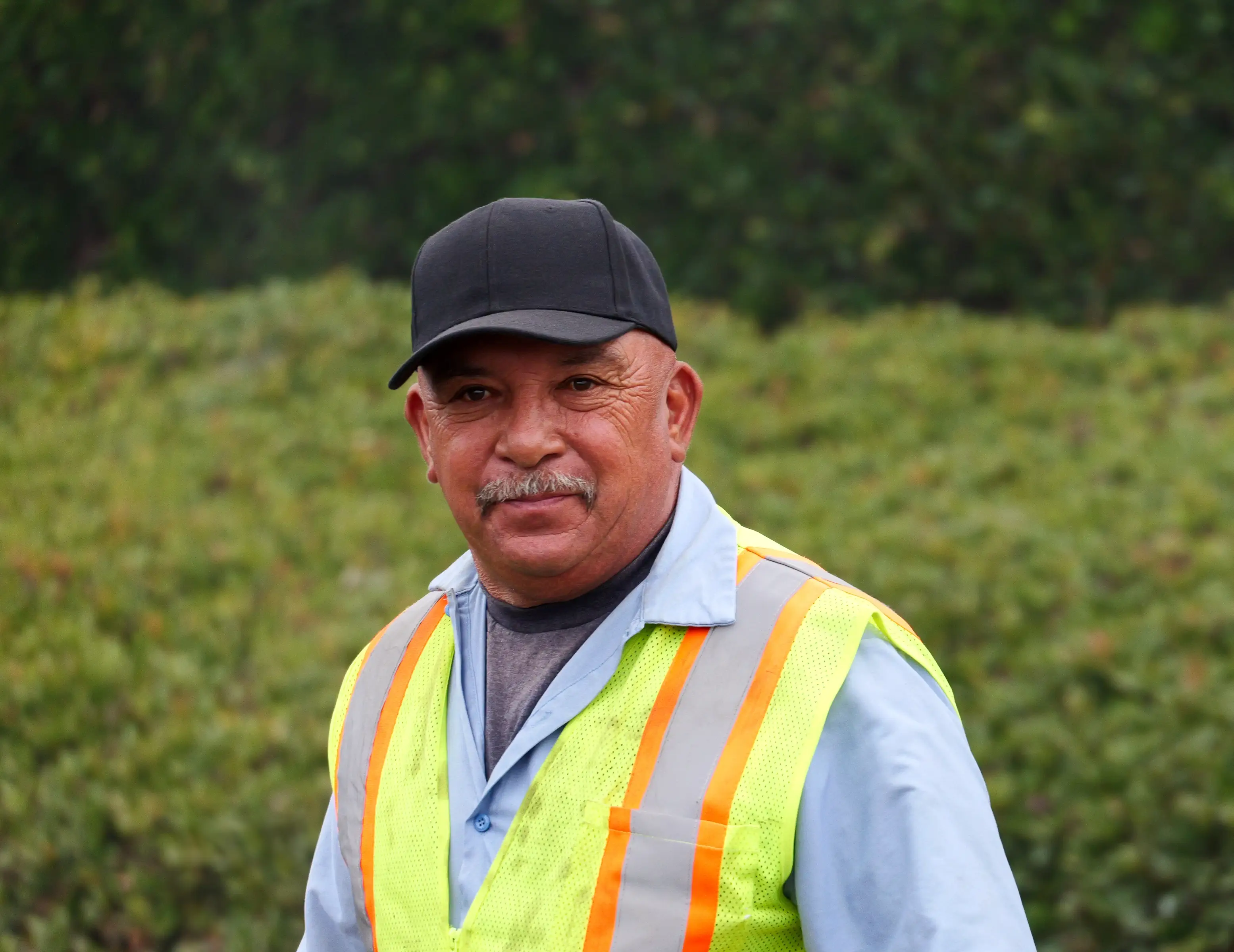 Closeup photo of asphalt crew worker