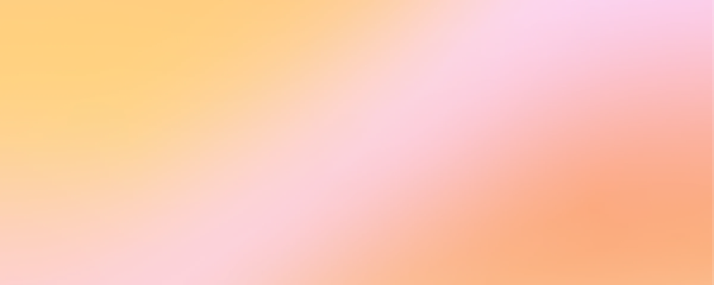 Abstract gradient background featuring vibrant shades of orange and pink blending harmoniously.