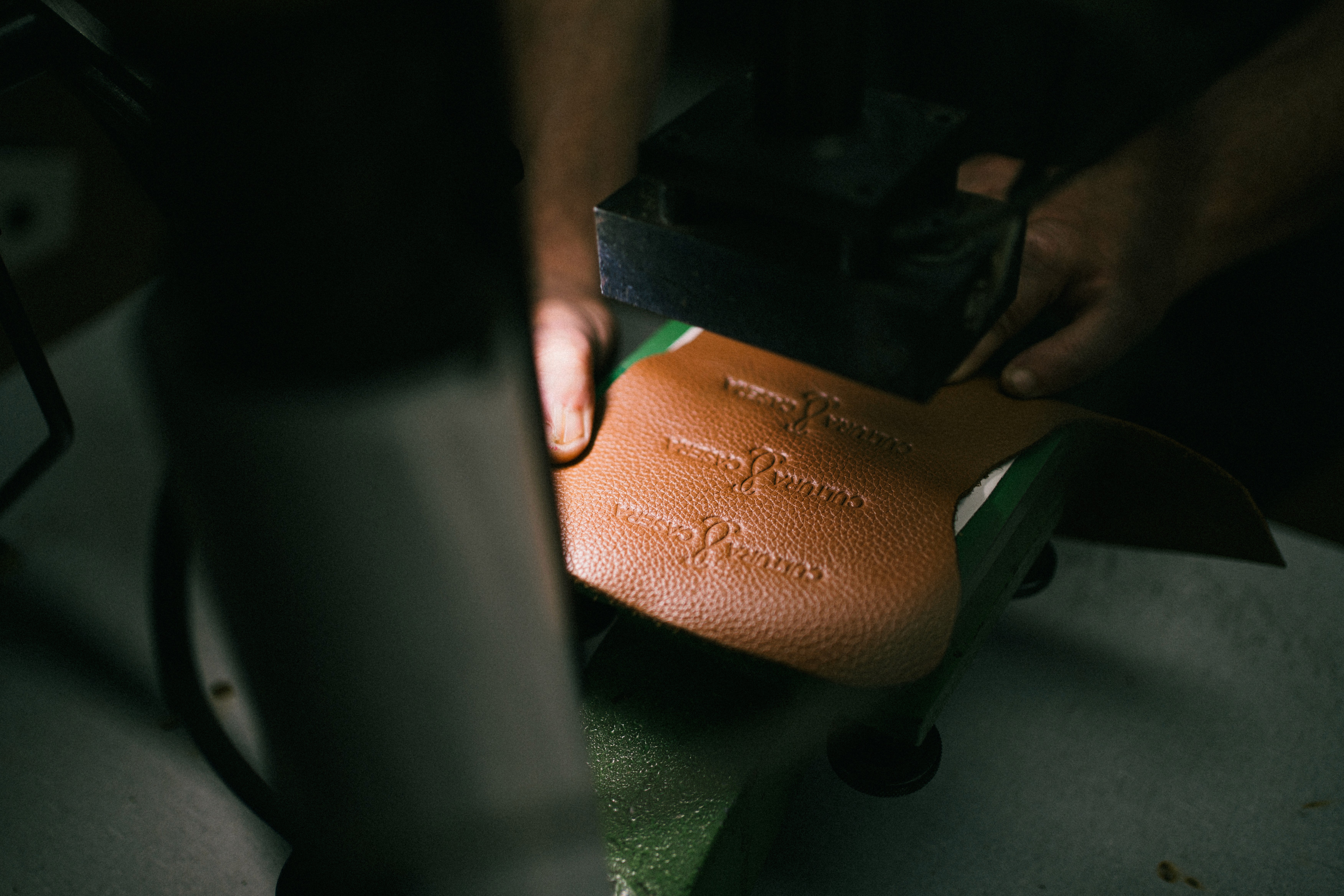 A man wearing a virtual reality headset, immersed in a digital experience, with a focused expression on her face.