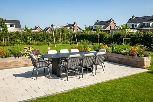 Elegant Antoni COCO garden furniture set featuring a spacious oval table and comfortable chairs for outdoor dining.