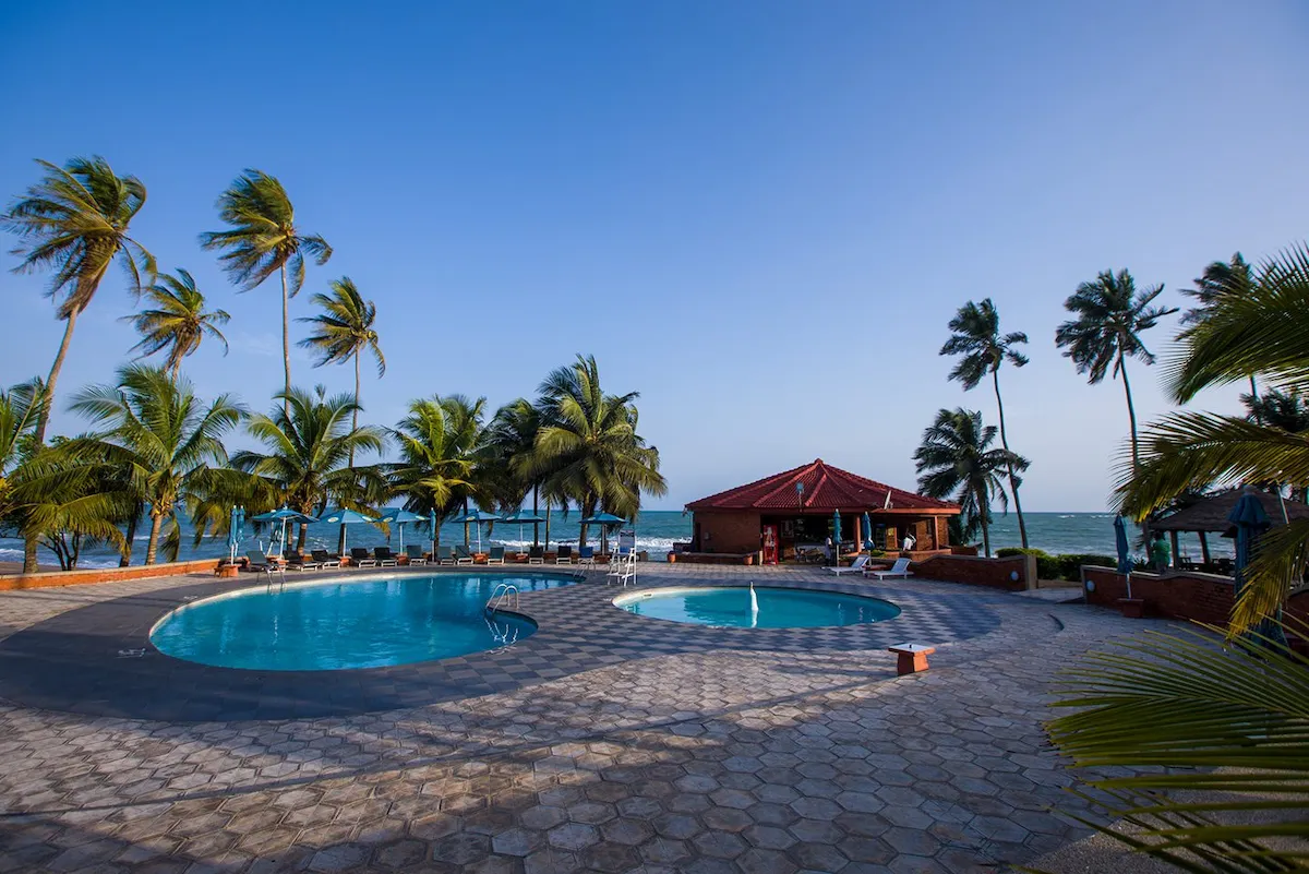 Beachfront pool at a coastal resort in Ghana on the Cape Coast After Dark experience. 