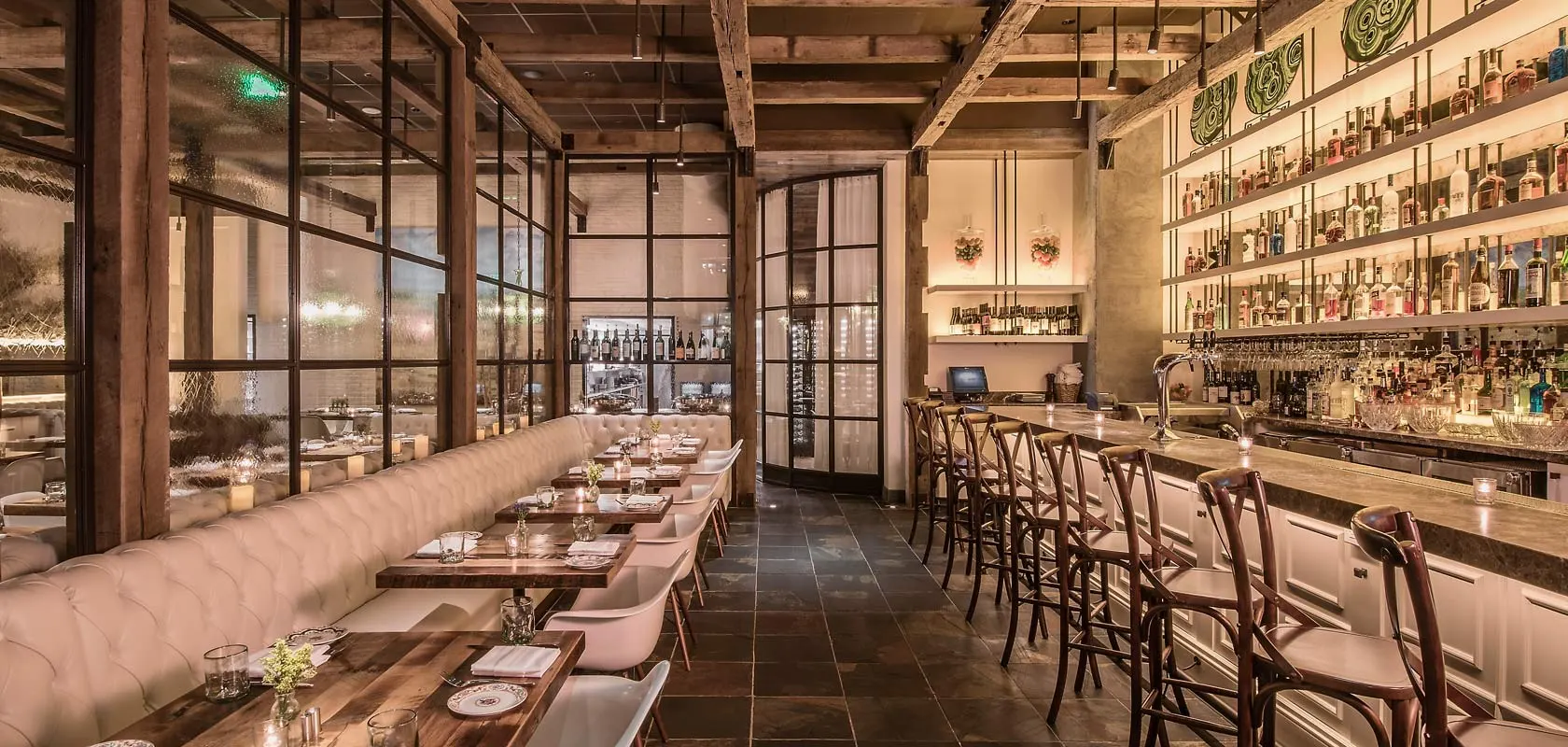 Banquette seating and long bar at The Guild House
