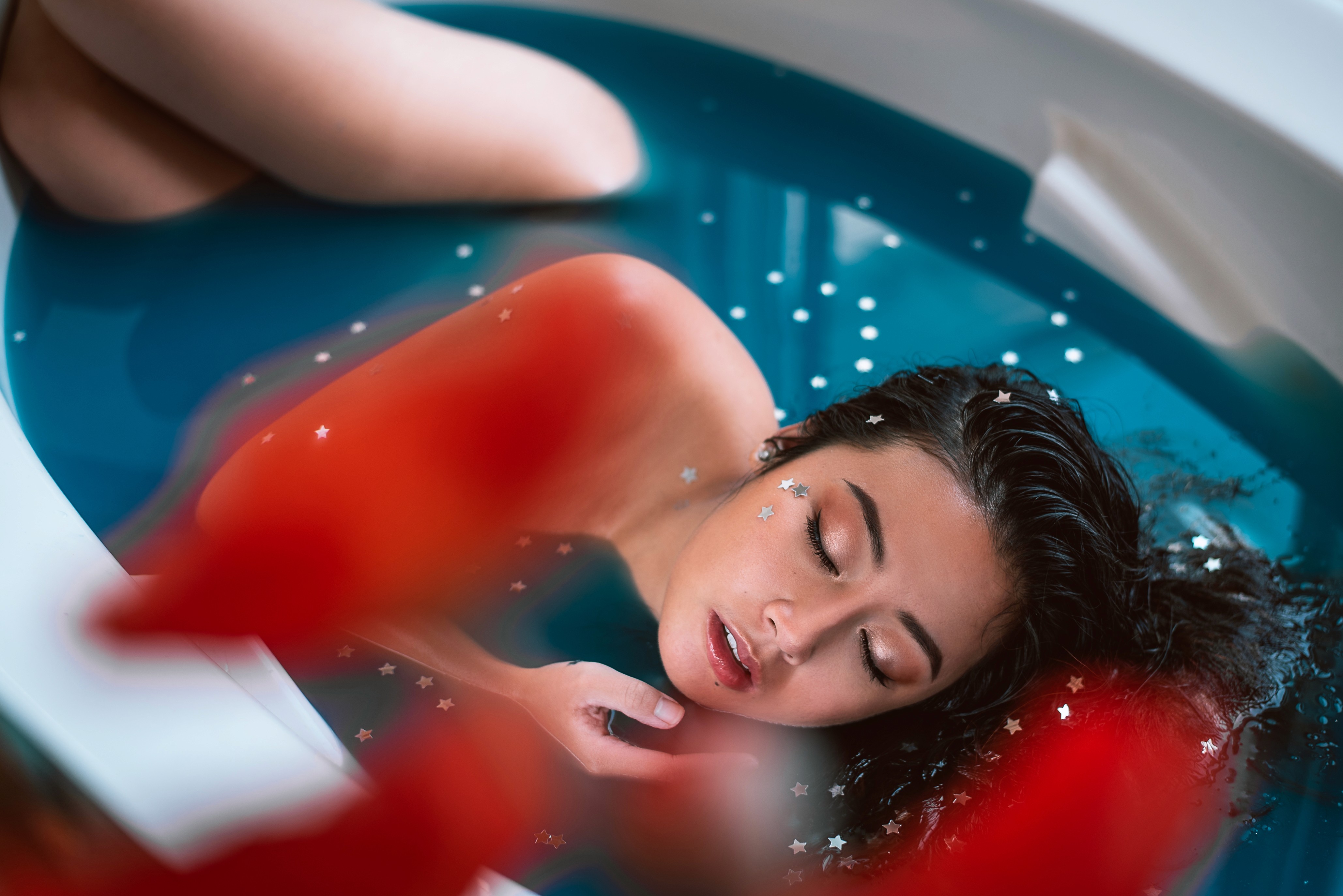 beautiful photography of women in blue bath tube