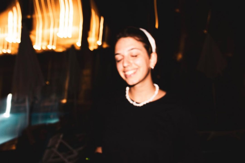 person in black and white nike sneakers