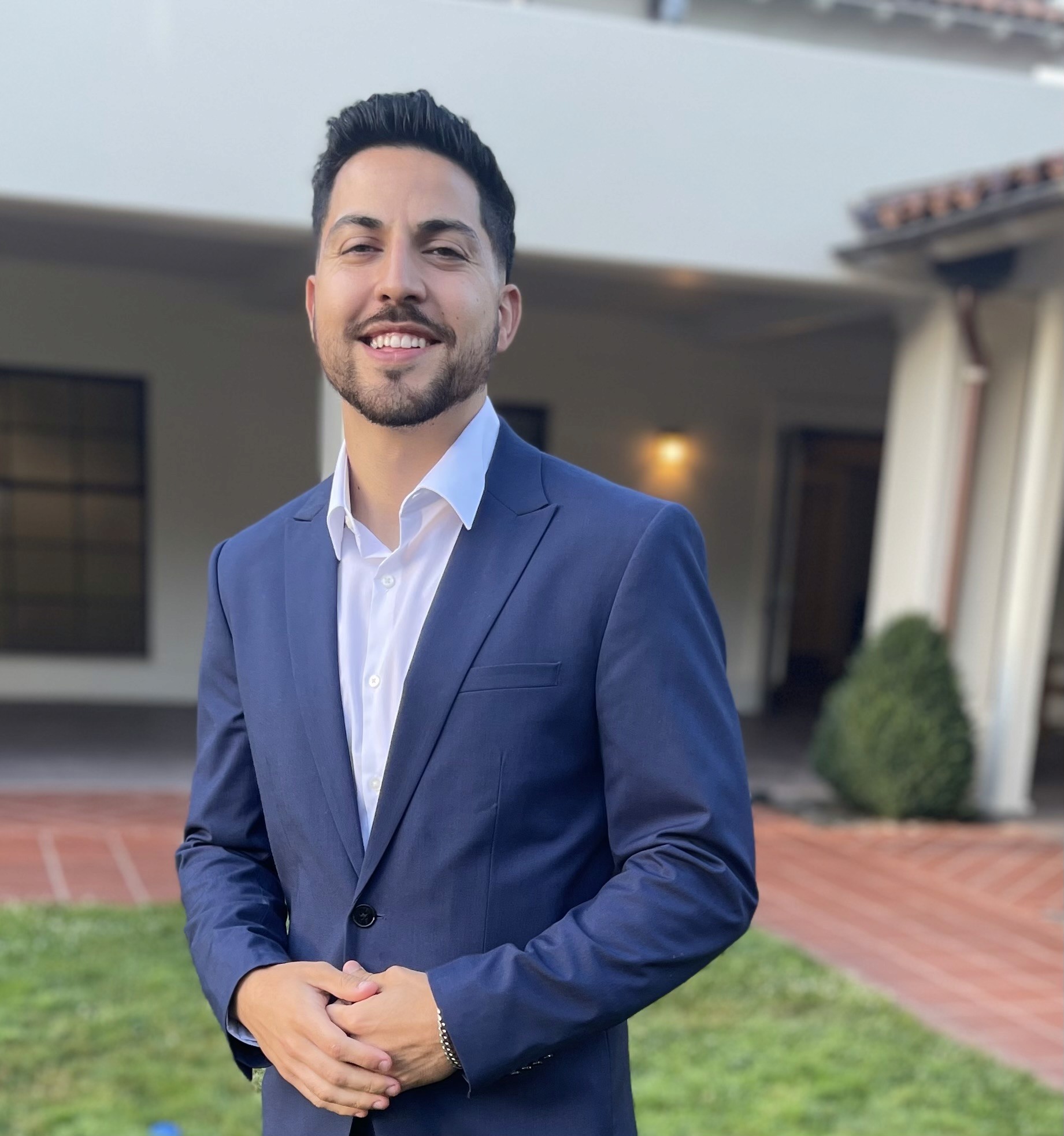 man focus photography of man in green collared top