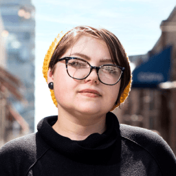 Possible member looking at the camera.