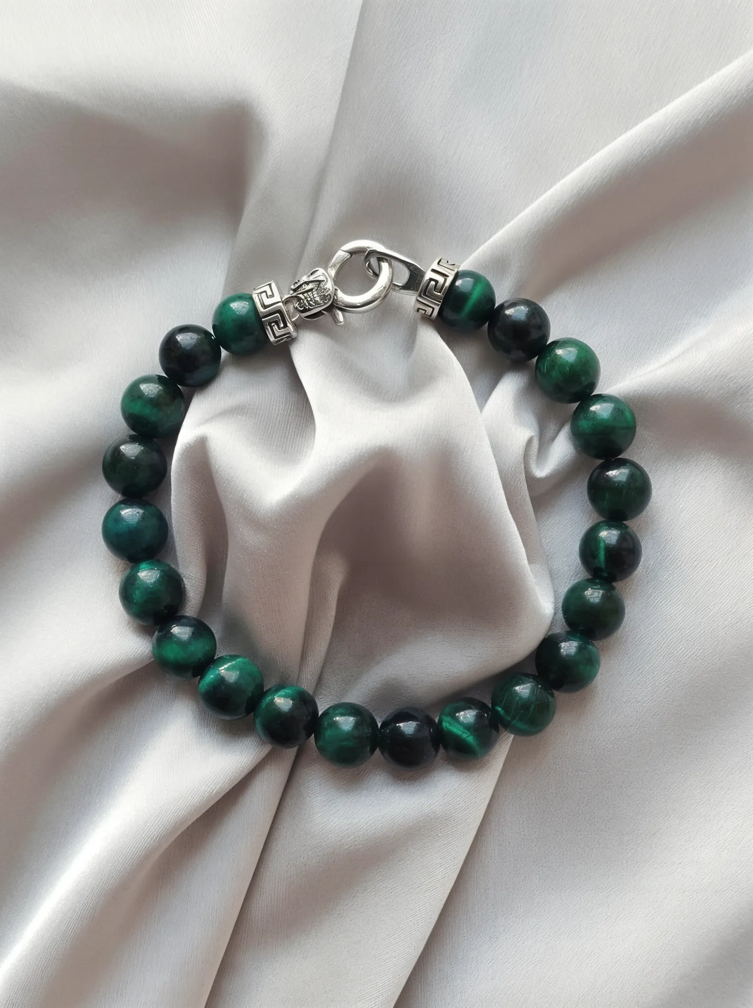 Bracelet placed on a fabric setting.