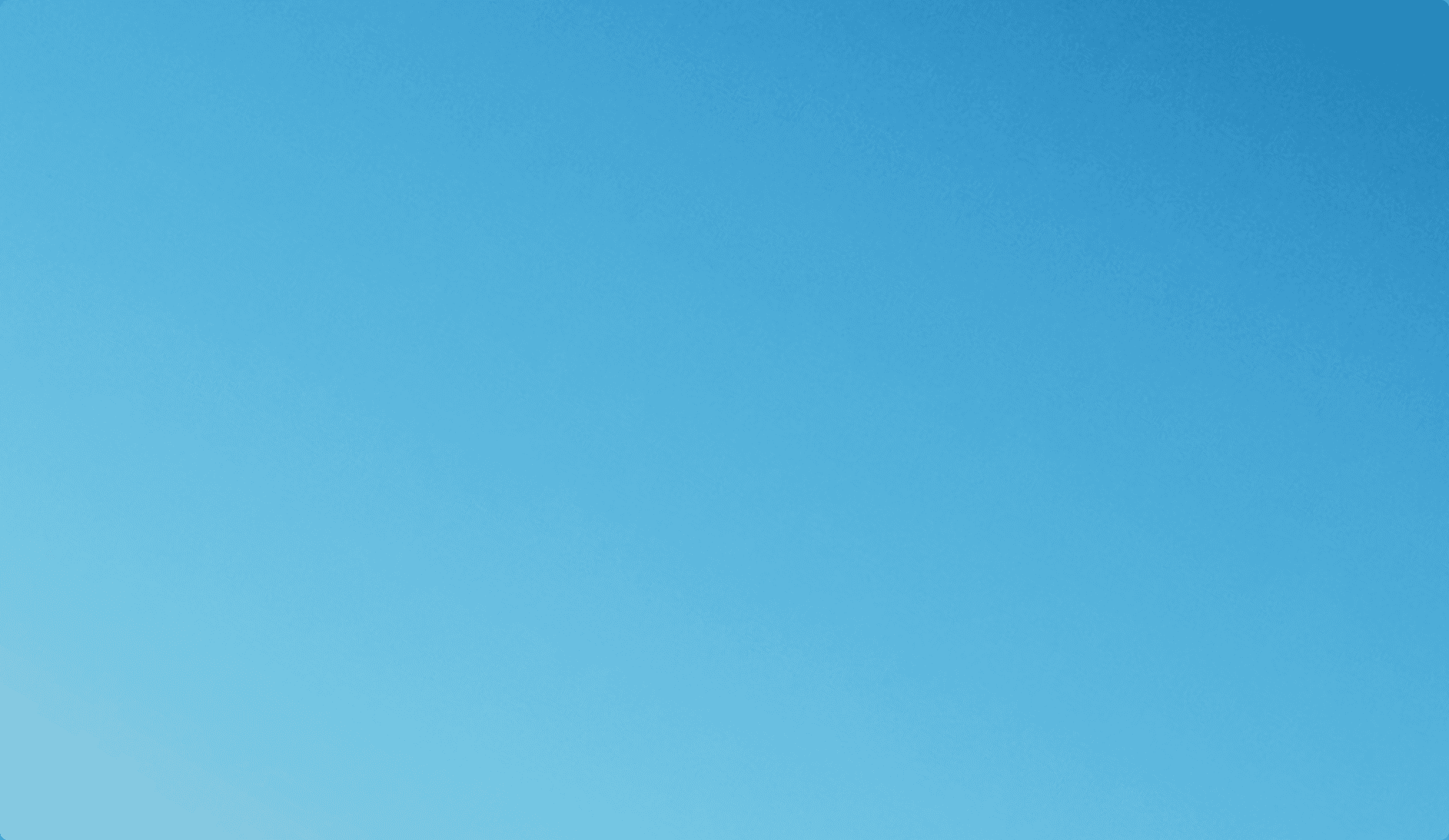 kids lying on a glass land and smiling