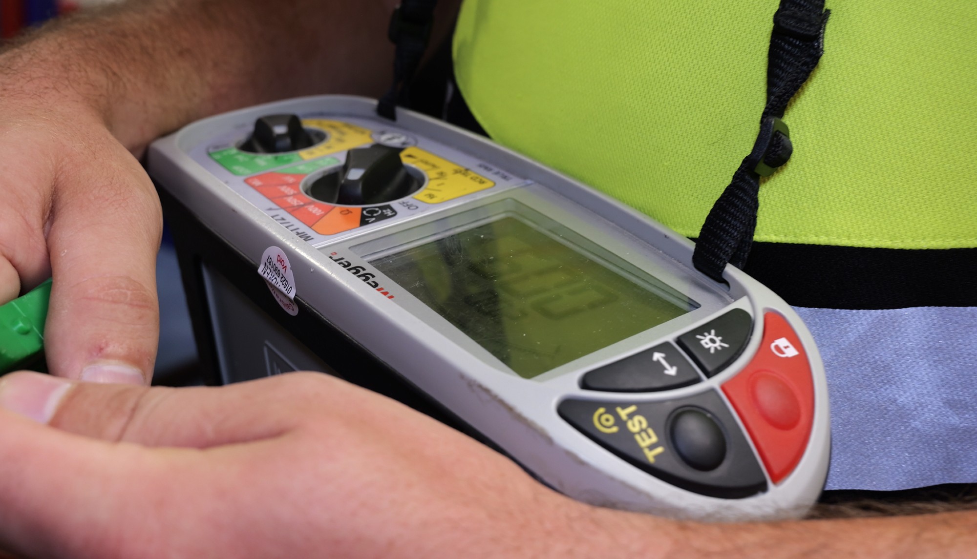 Young aprentice at Azure Electrical doing a PAT Test for a mainstream London School