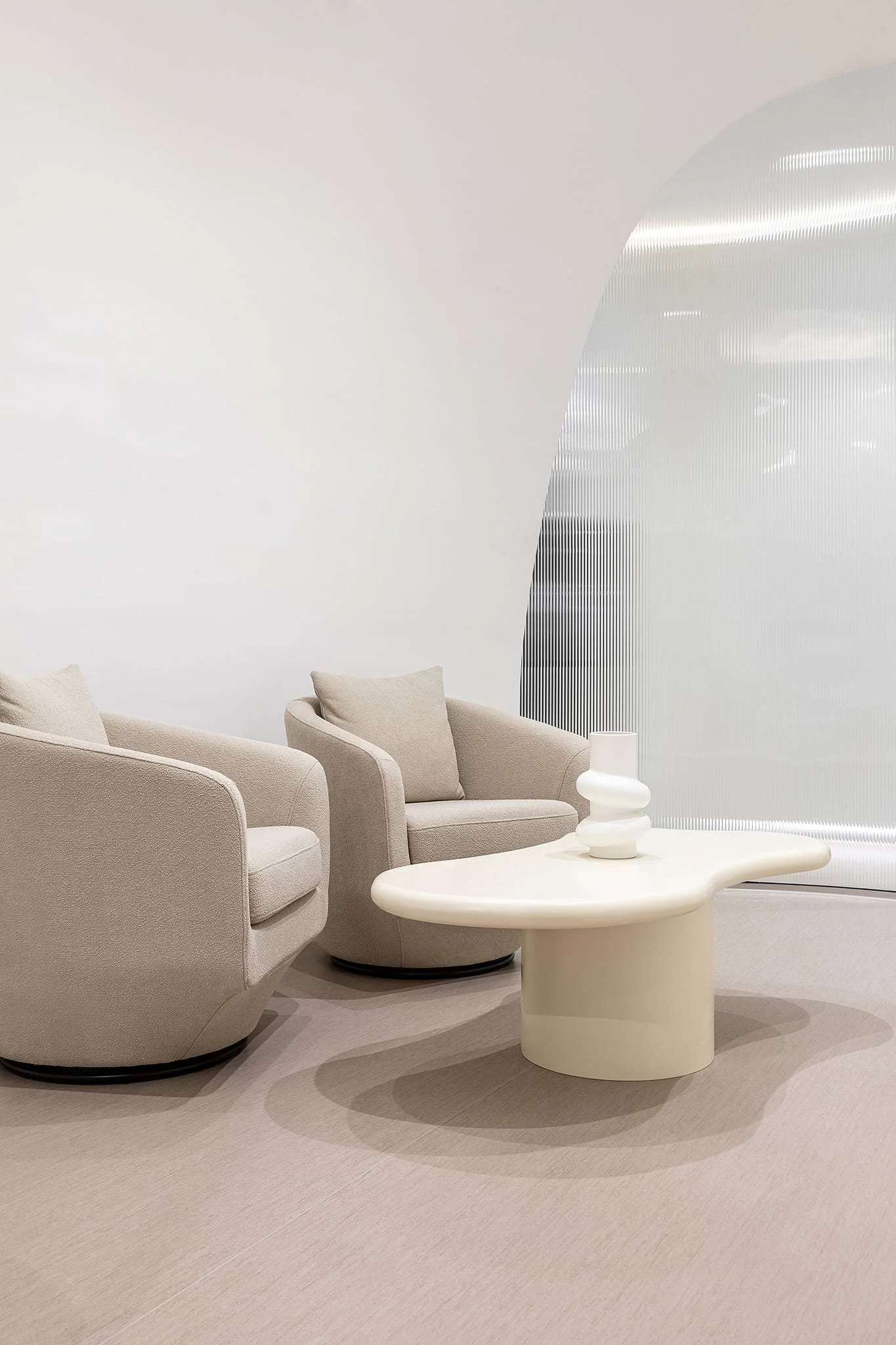 Waiting lounge with armchairs and a round table