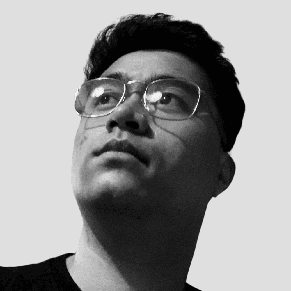 A portrait of a young man smiling