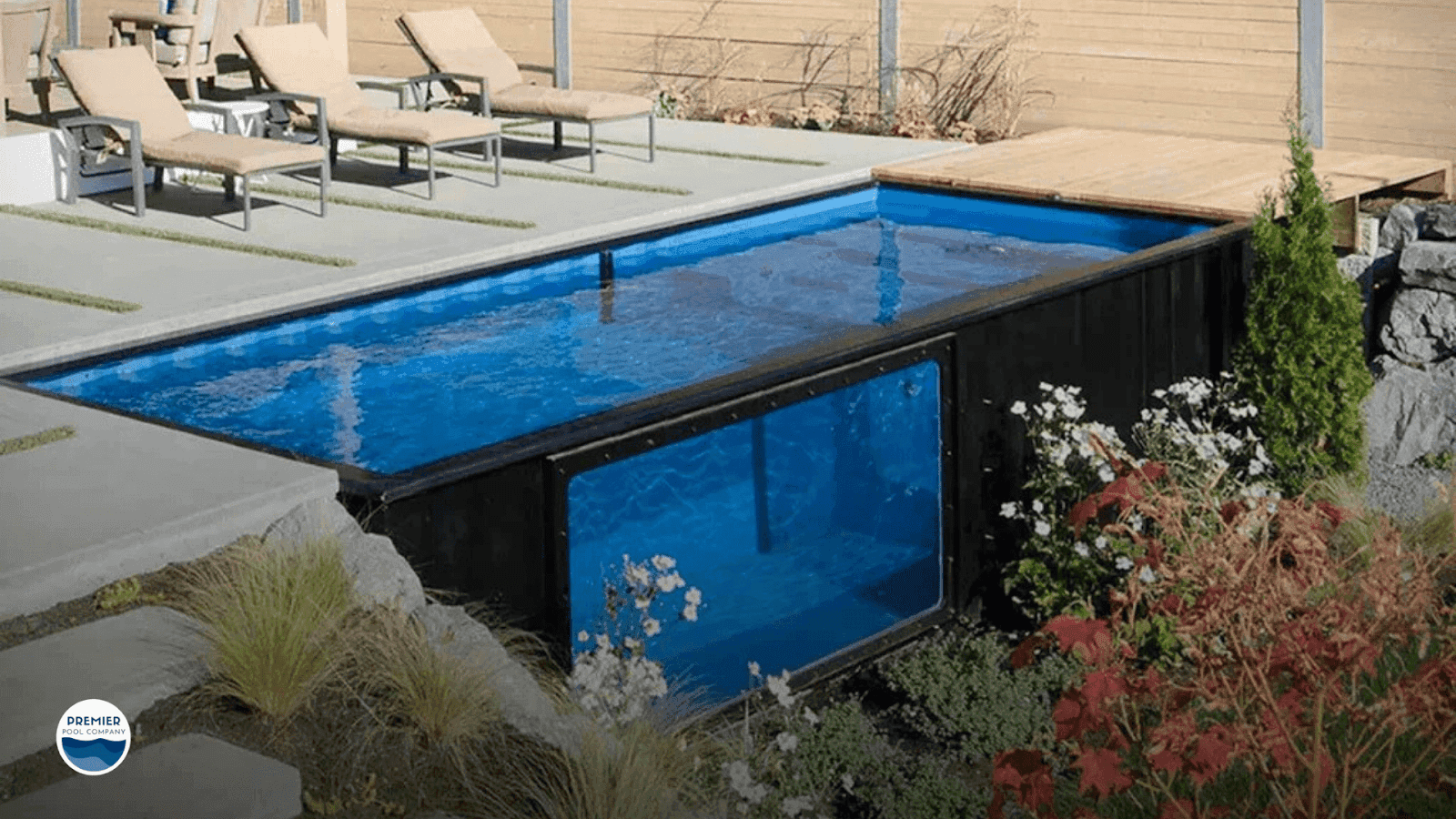 Finished shipping container pool with high-quality liner in a landscaped Ohio backyard.