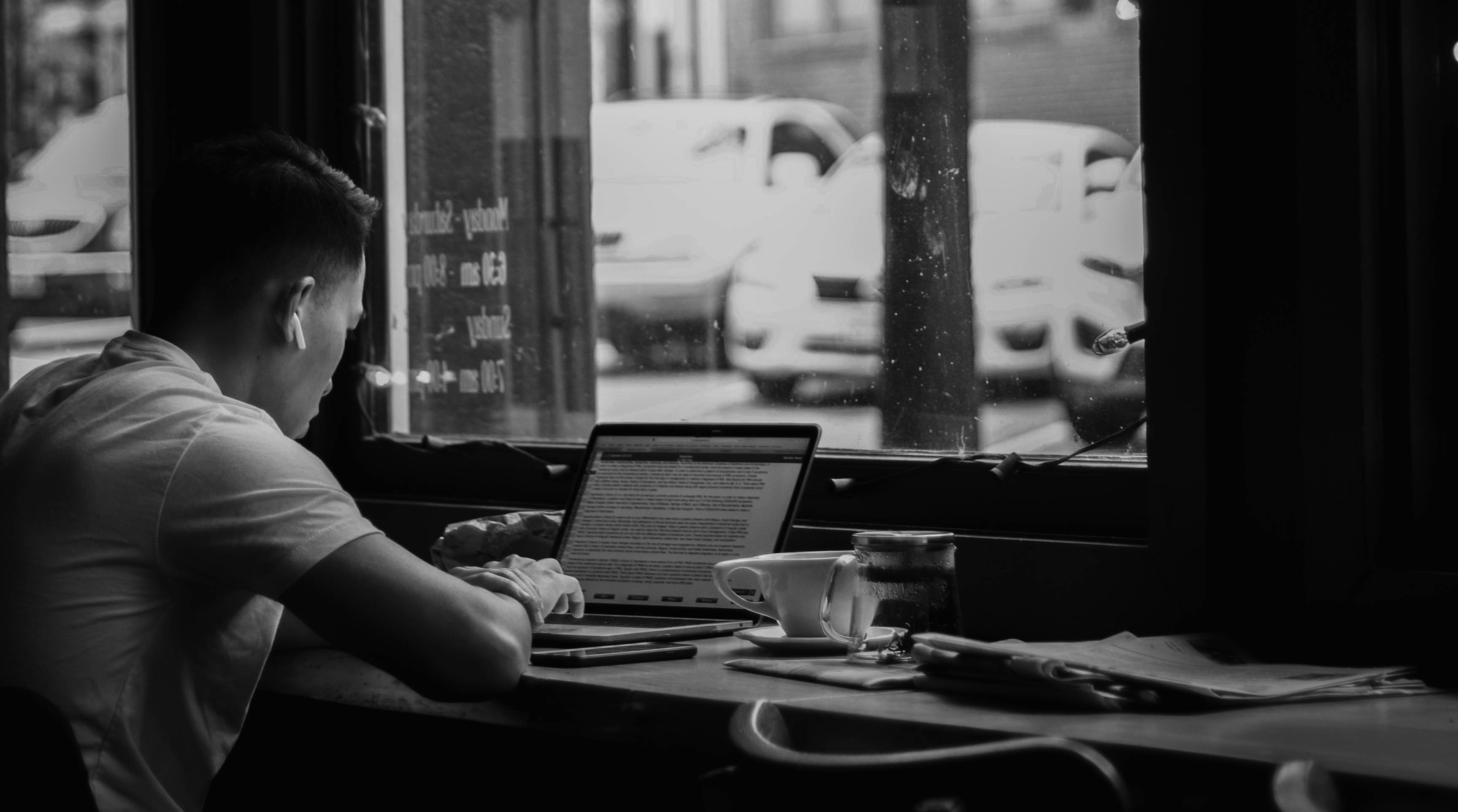 man sitting alone using Document Summarizer