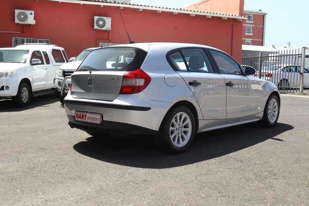 man in white crew neck shirt wearing black framed eyeglasses