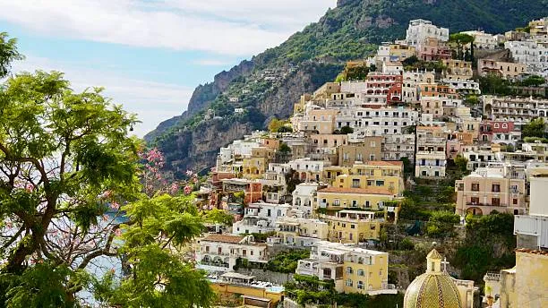  Positano's pastel houses cascading down cliffs