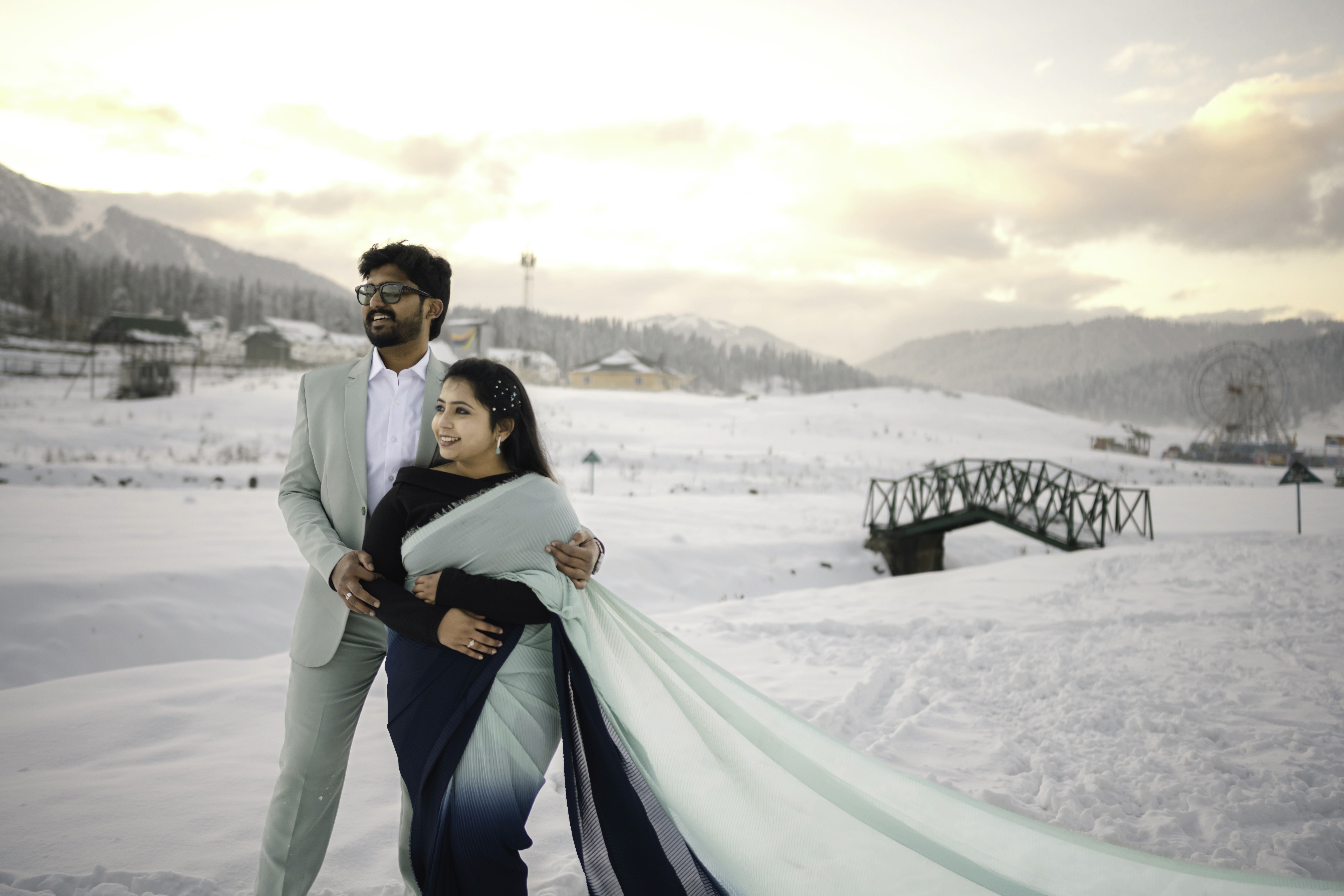 Pre-wedding couple photoshoot collage by a lakeside at golden hour, bride in pink saree with henna details, by Wow Makers photography in Hyderabad, India.