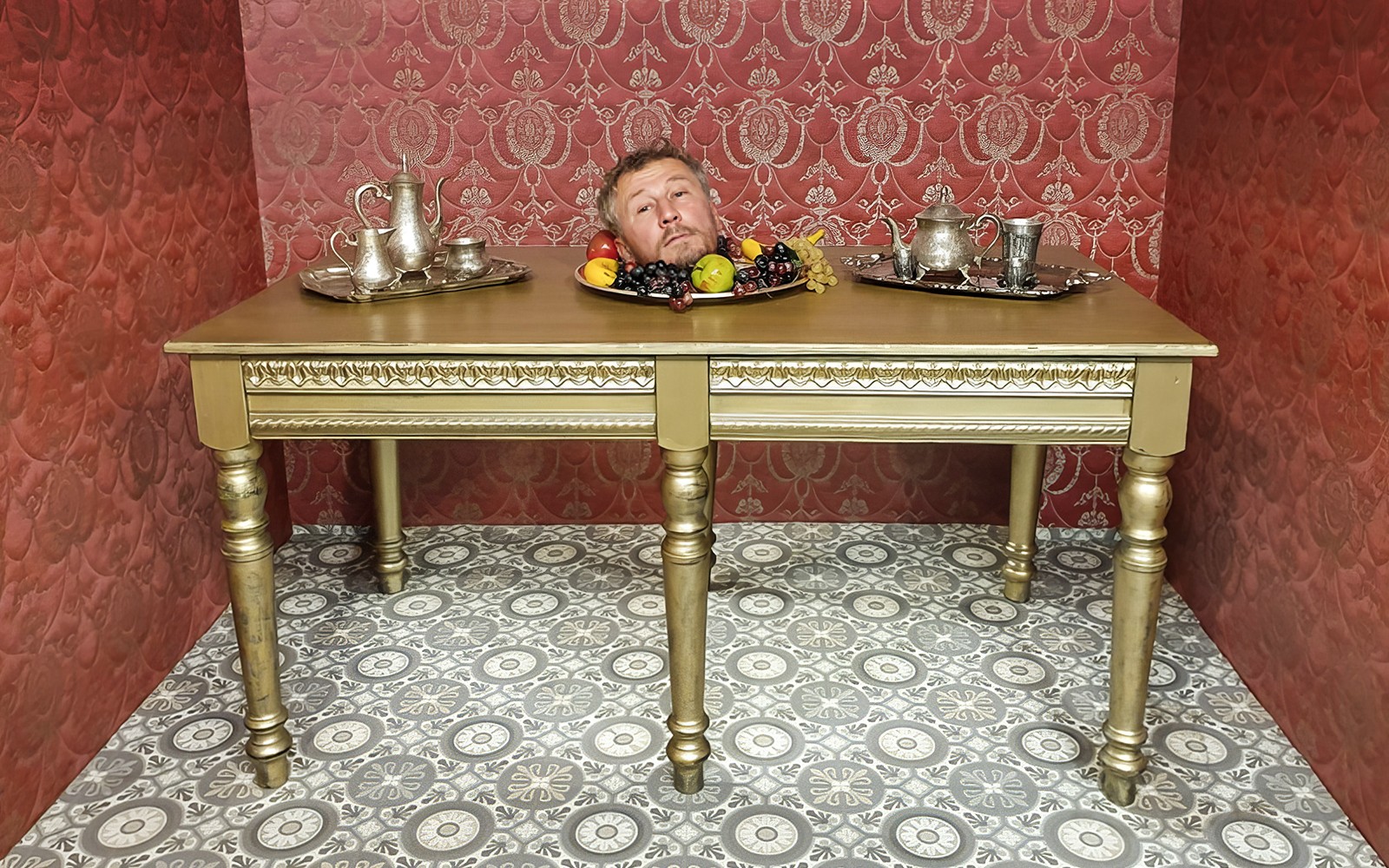 A male tourist enjoying at Museum of Fantastic Illusions in Prague