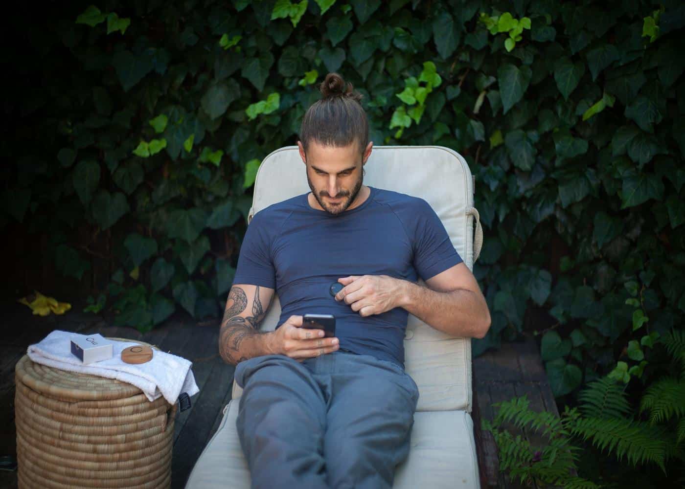 Waking Up Review: Man relaxing with his phone