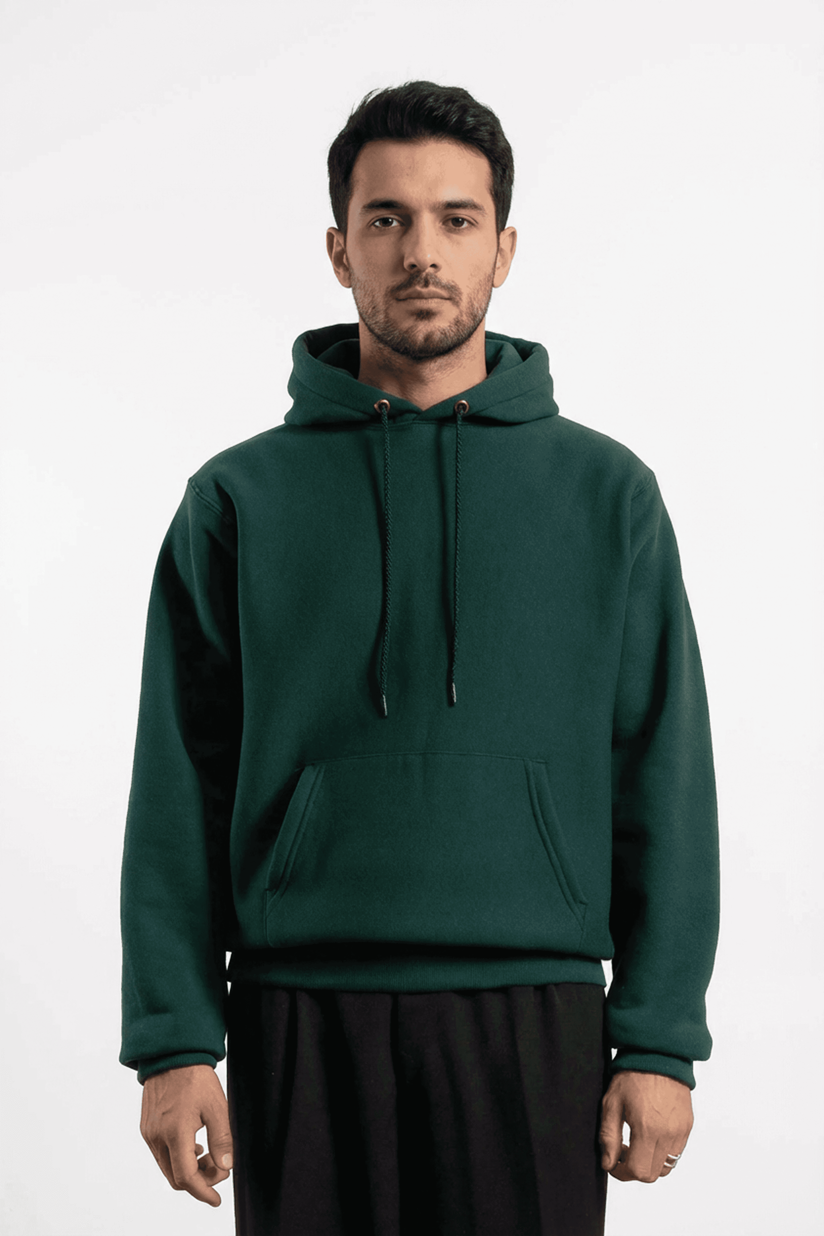 above the belly close up shot of a model wearing a green hoodie